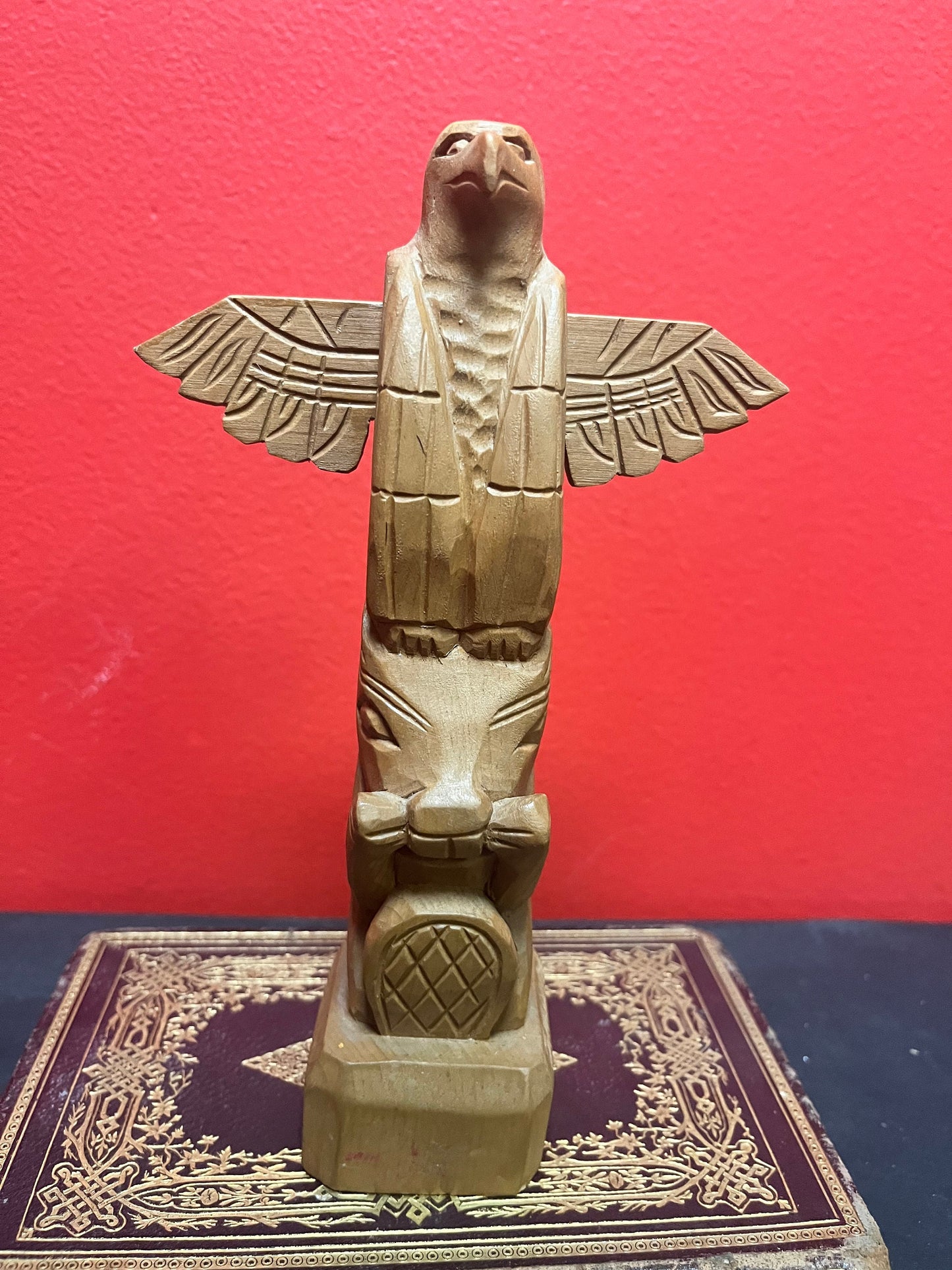 A Lovely older 8 inch indigenous first nations pacific northwest coast cedar eagle to bear transformation totem pole great detail