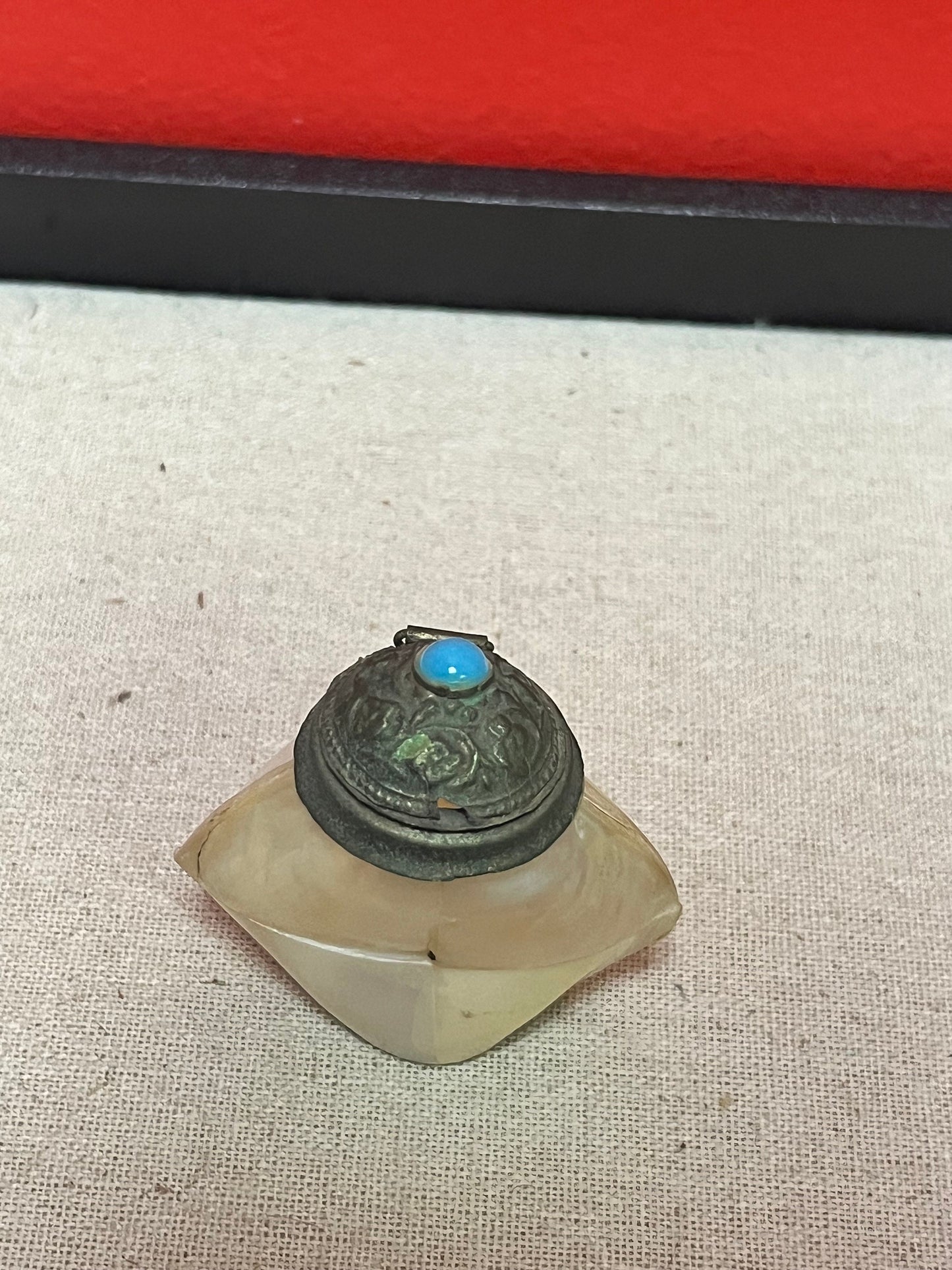 Lovely, 2 inch high shell and bronze bottle  with cartouche  As is  priced accordingly