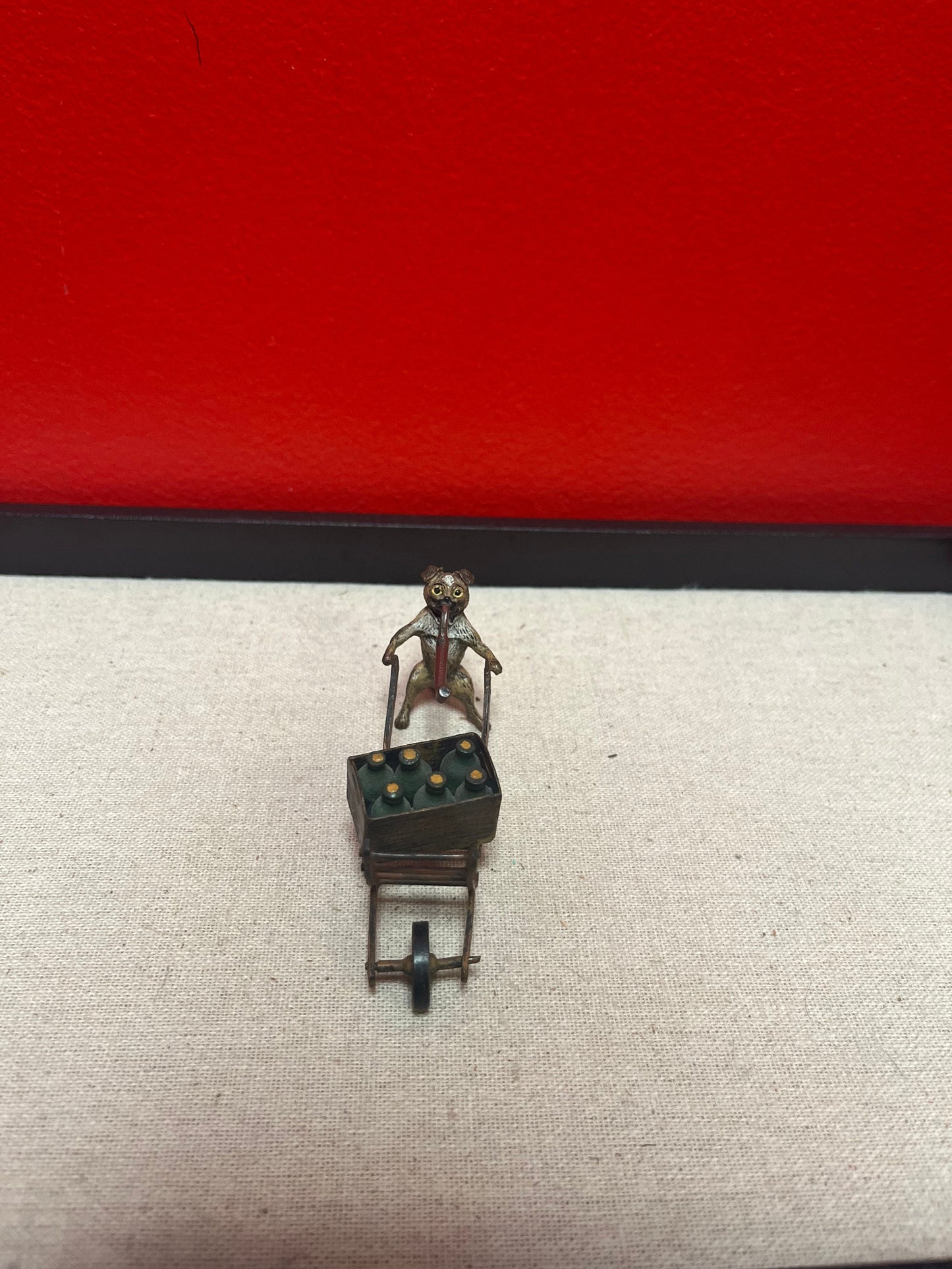 Authentic 4 inch signed rare Franz Bergman call painted Austrian bronze of a pug dog pushing a cart   wow