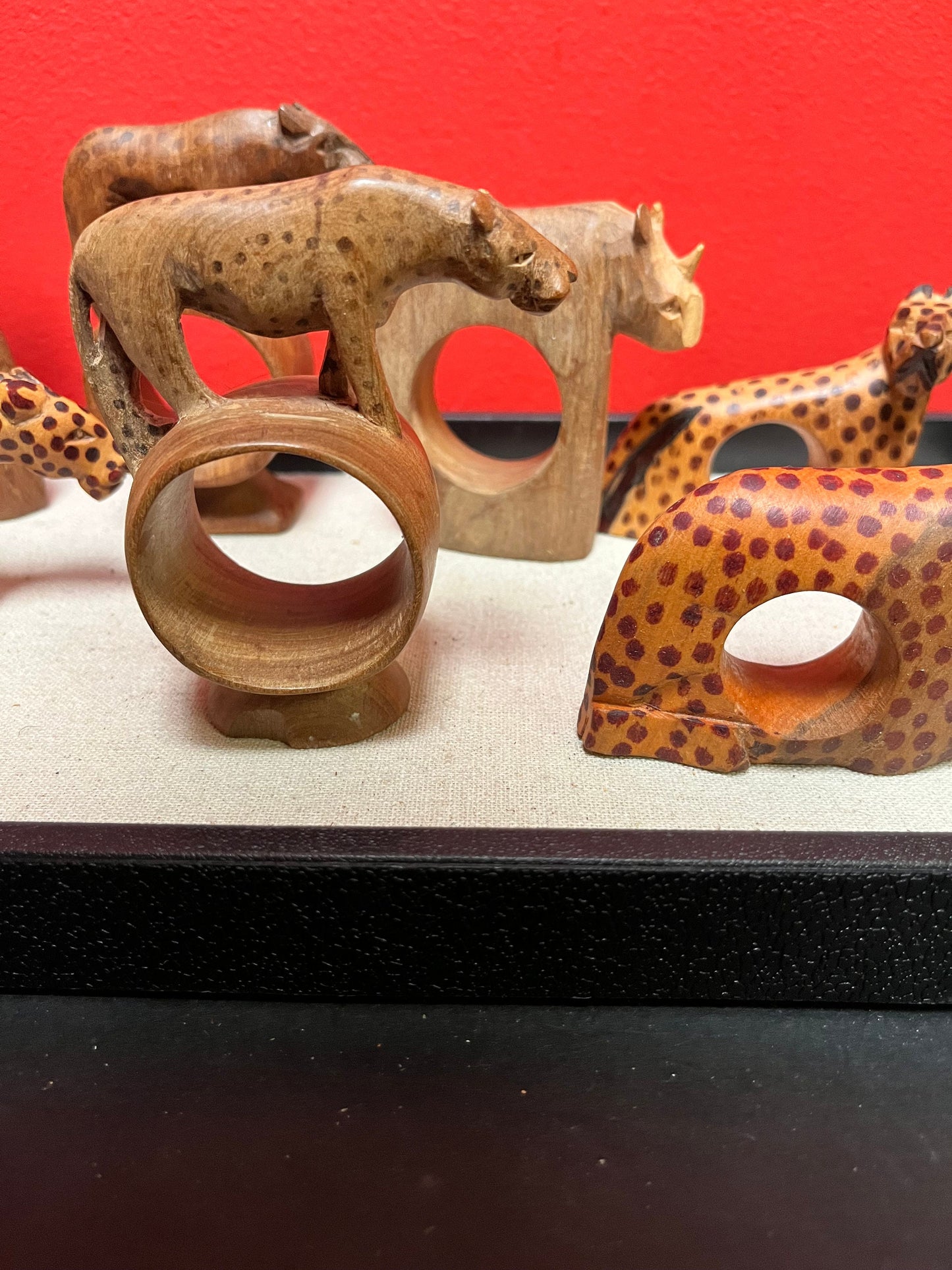 Wonderful lot of African wood napkin ring holders 8 pieces approximately 4 inches each great price for all