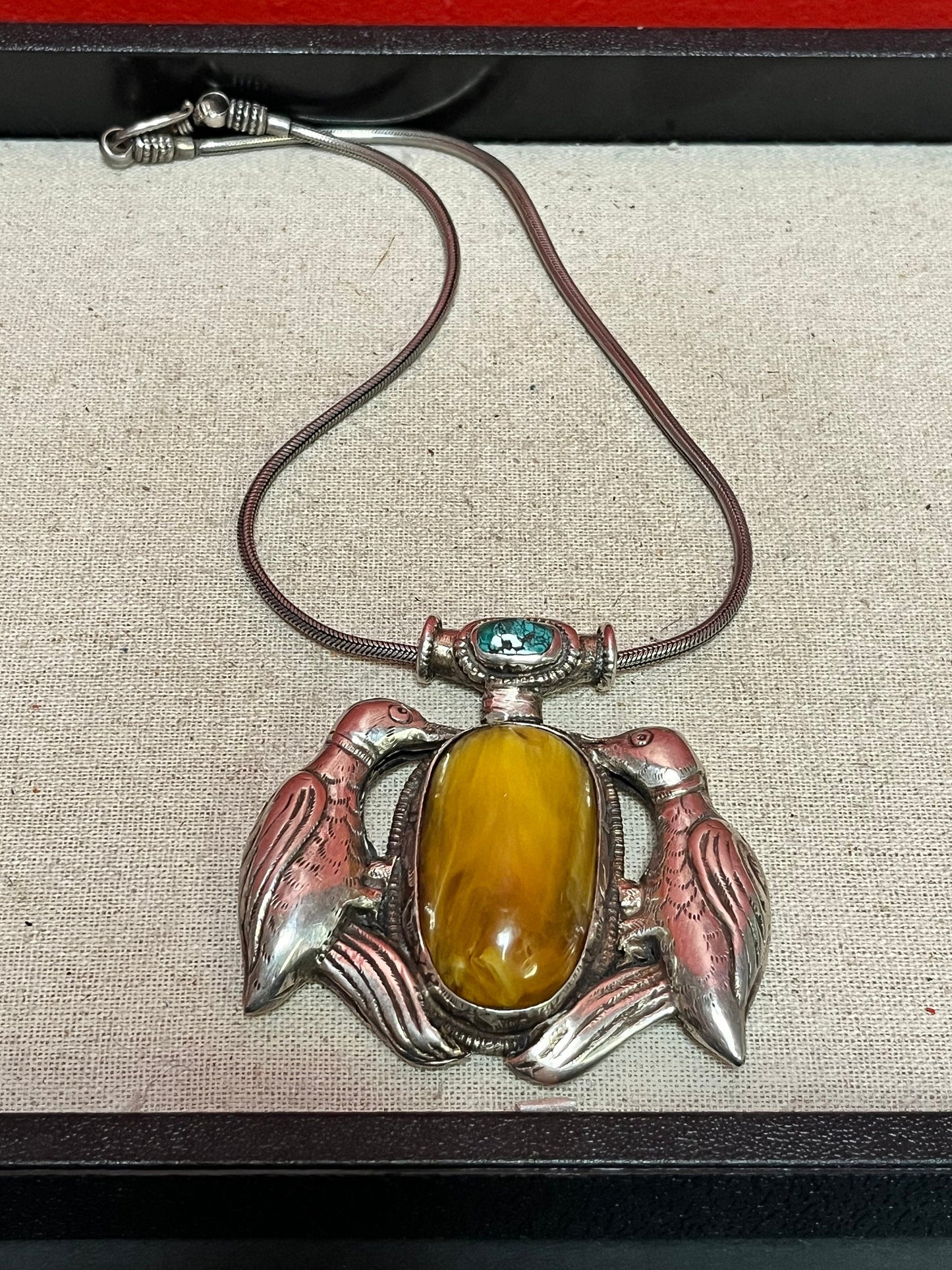 Huge Navajo sterling silver 3 inch pendant with inset turquoise and amber like stone comes with silver chain amazing piece