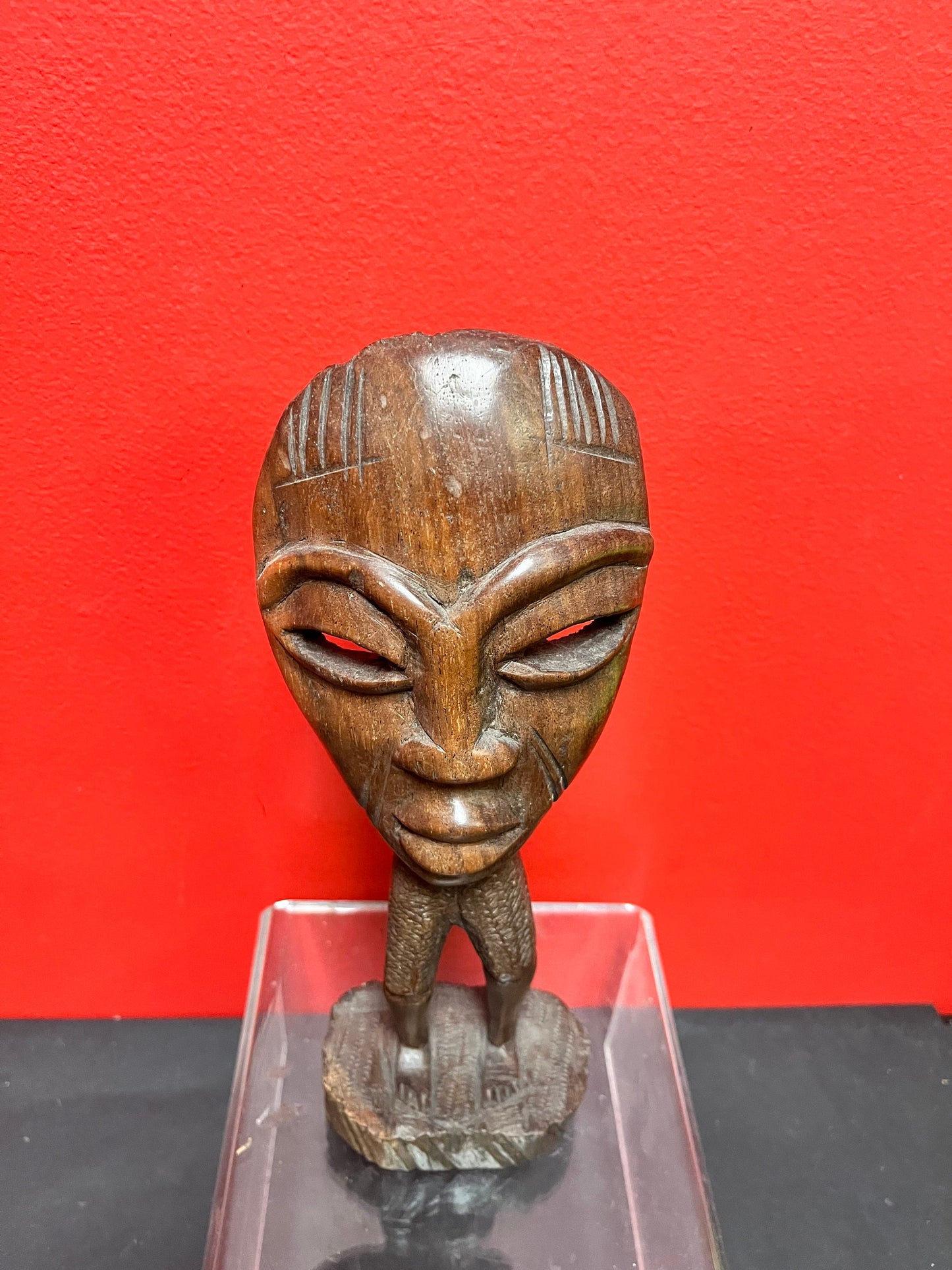 Beautiful 11 inch vintage African iron wood masked man statue