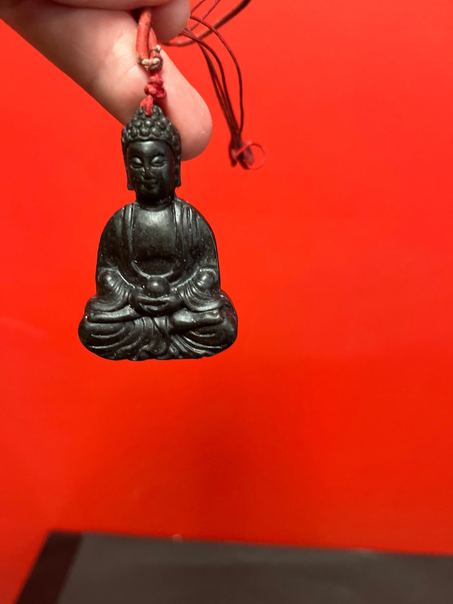 2.5 inch long older Asian black stone, Buddha pendant with original necklace lovely detail