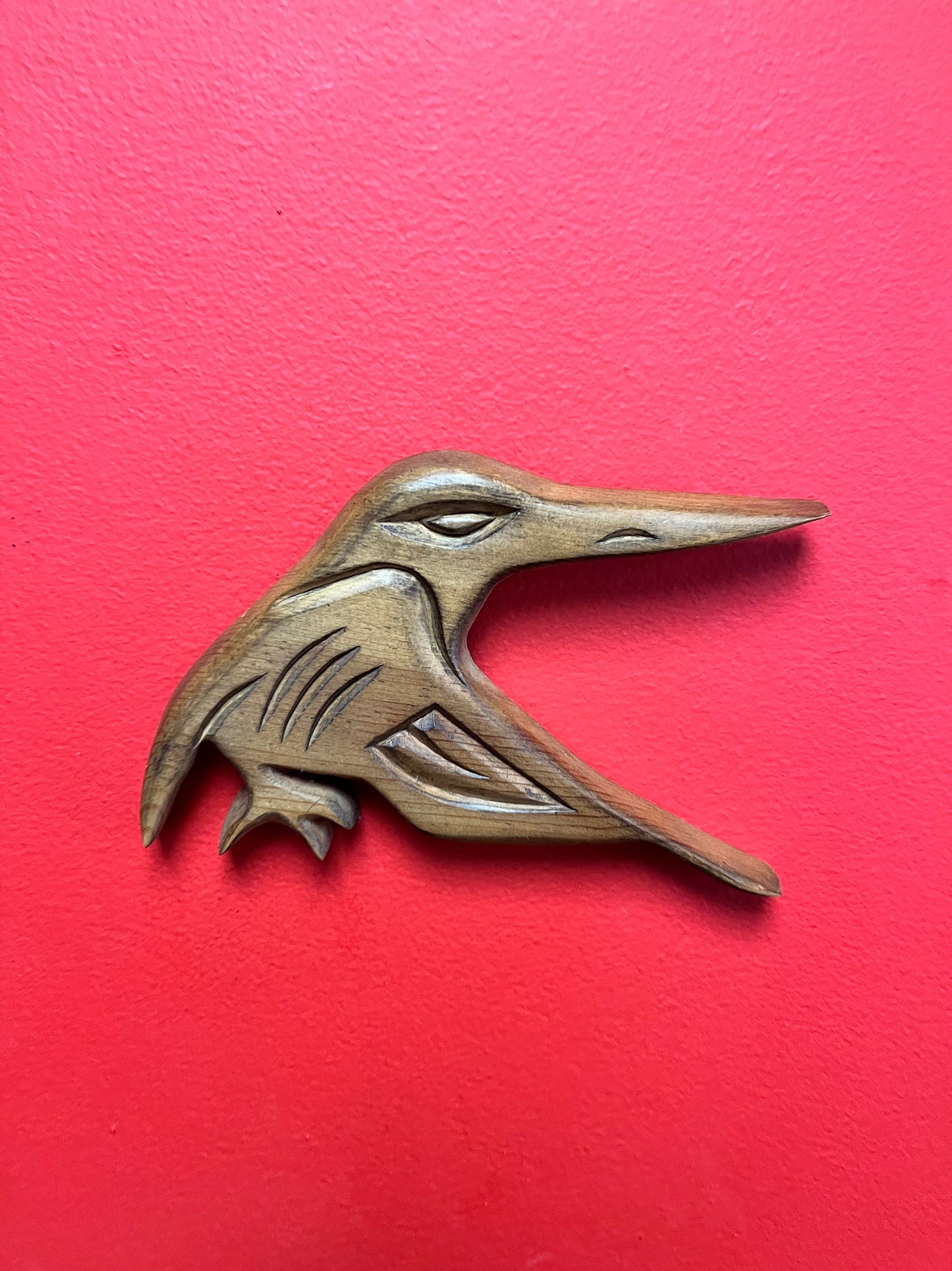 A Lovely detailed 8 inch long indigenous First Nations pacific north west coast signed hummingbird plaque