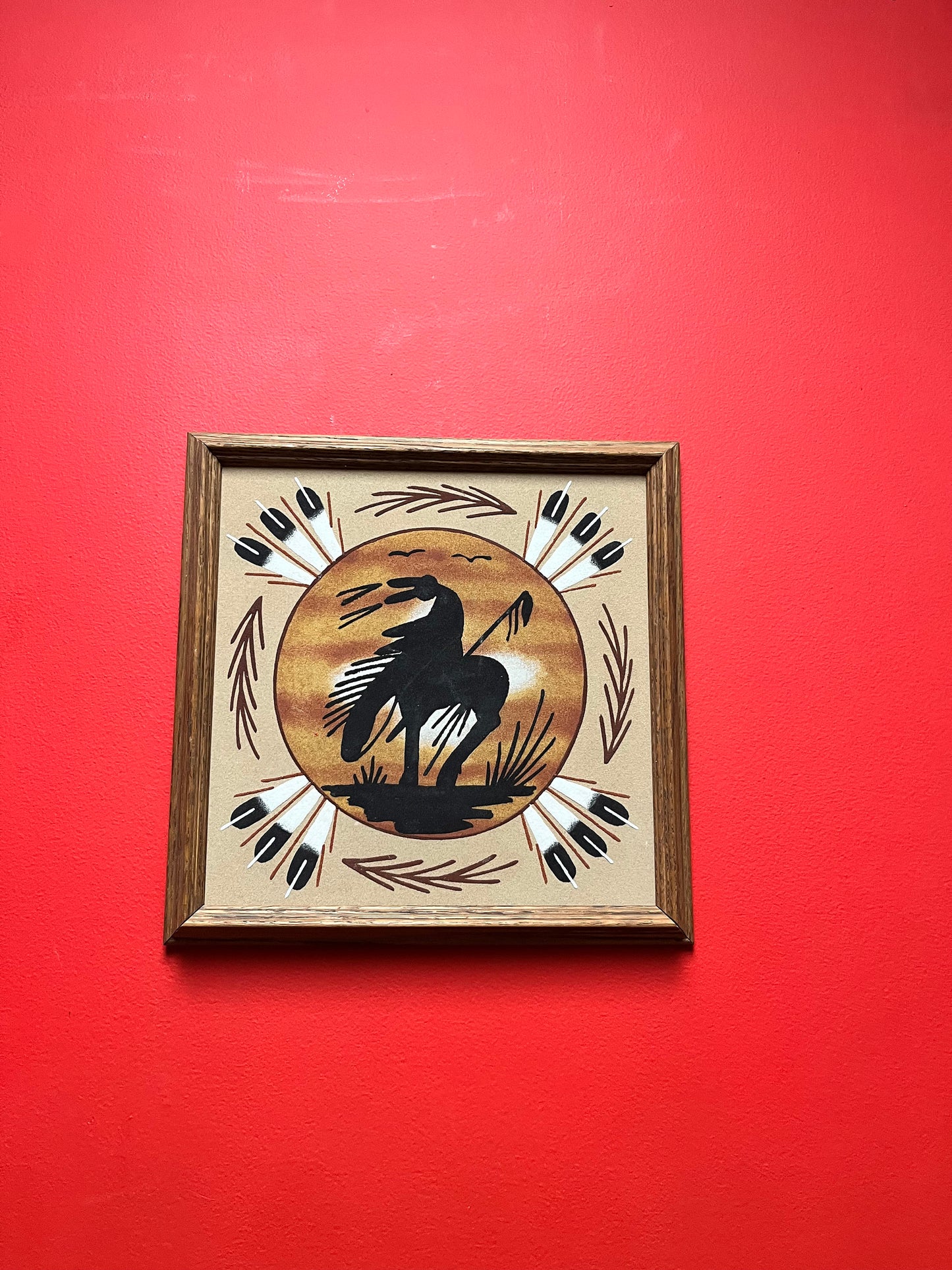Lovely 13 inch authentic Navajo sand painting in frame    signed on back with information
