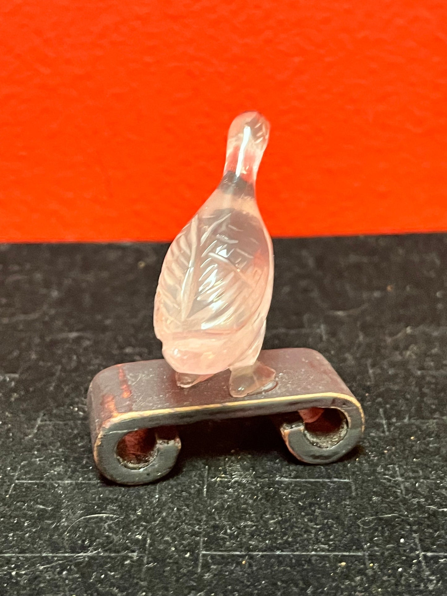 Lovely 2 inch high antique Chinese rose quartz  duck on wood stand   great value