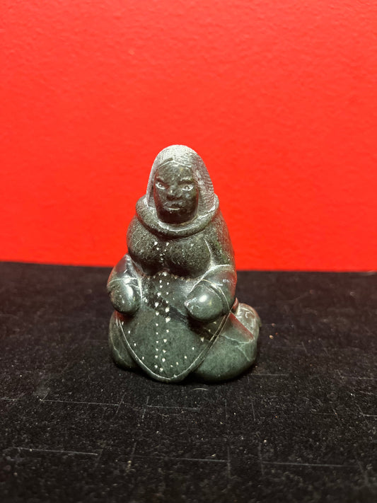 Exquisite museum quality  signed 3 inch tall antique, female artist indigenous  Inuit statue of a woman  intense quality and detail