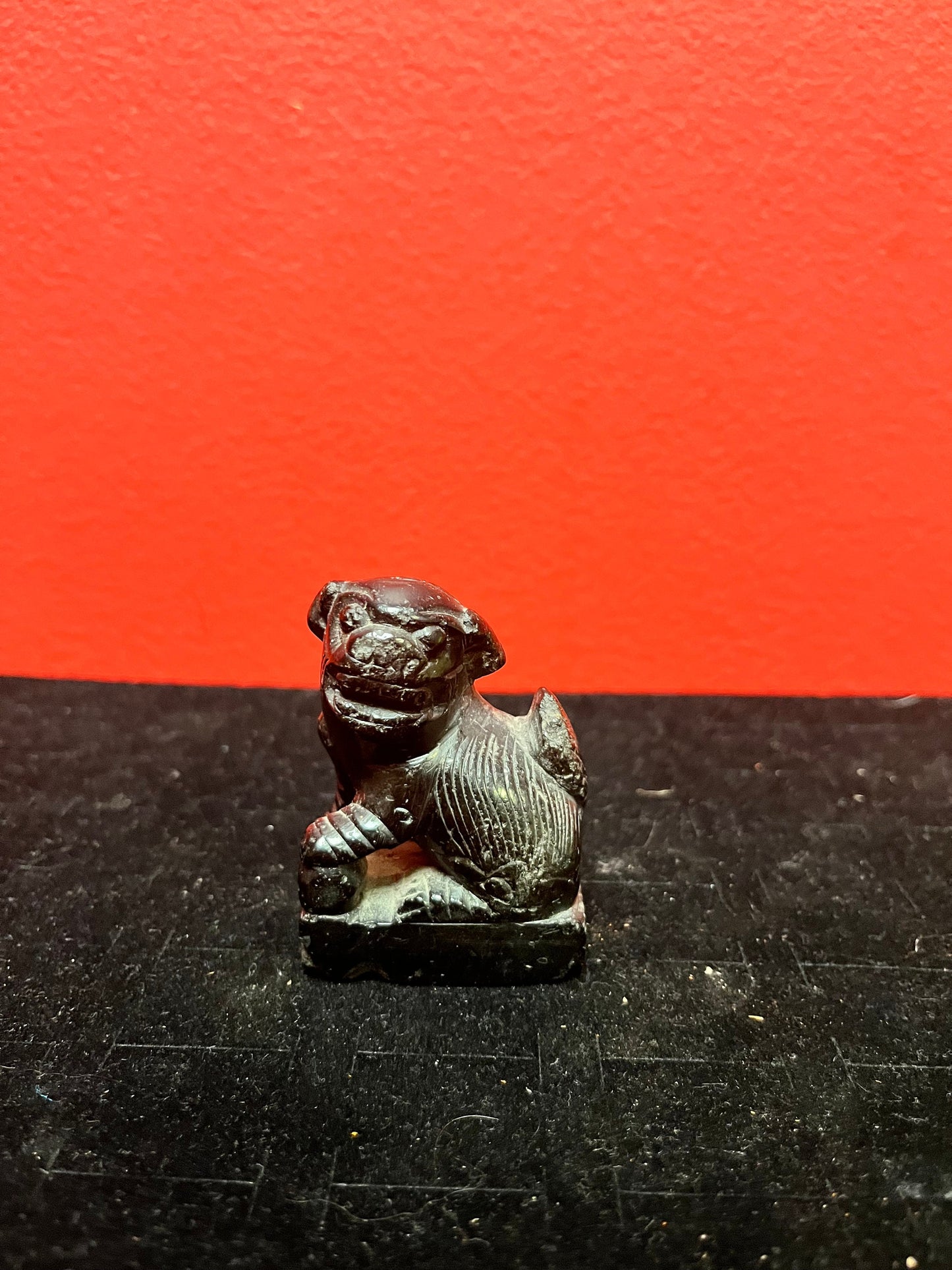 Lovely 2 inch tall stone foo dog
