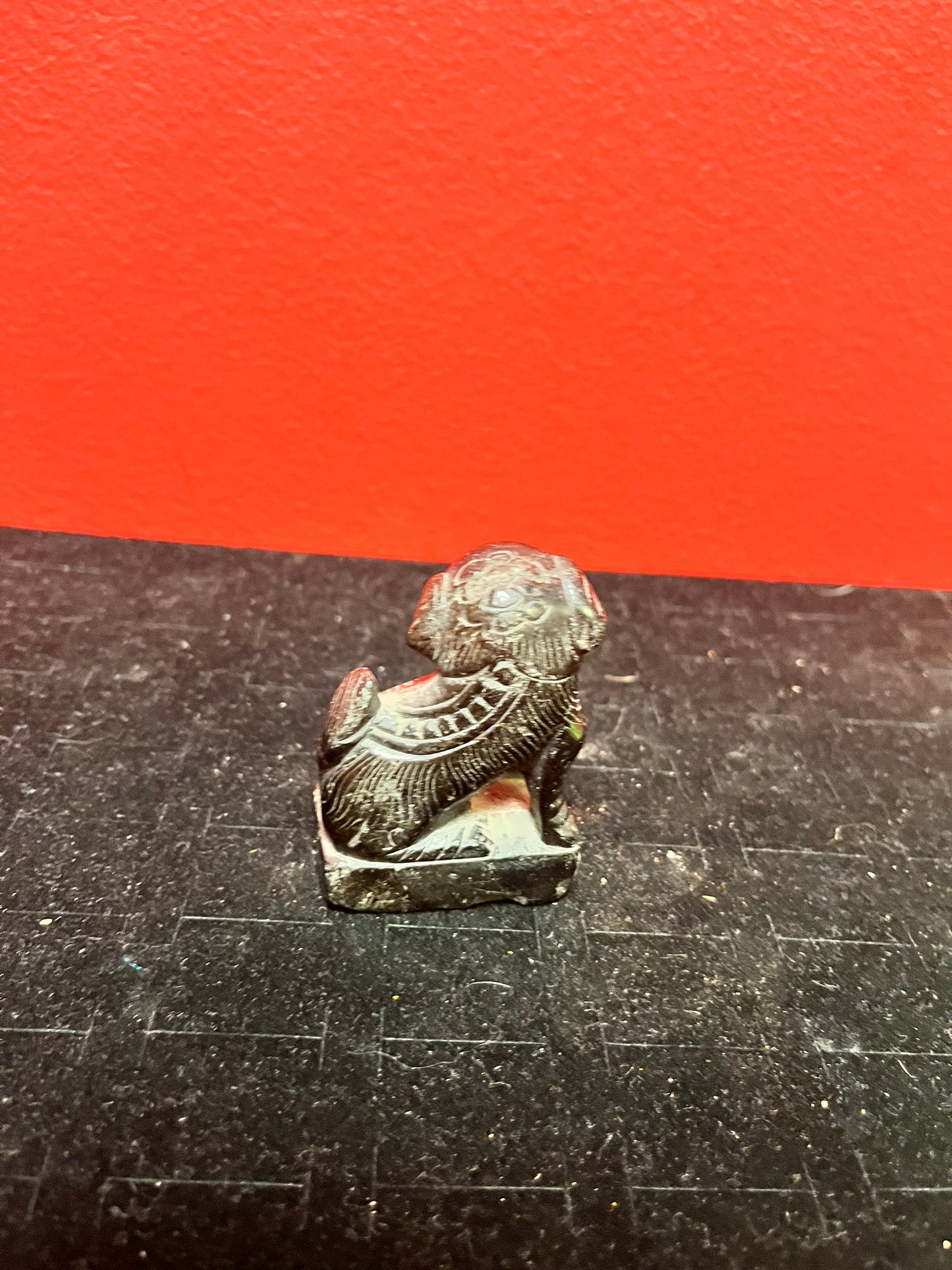 Lovely 2 inch tall stone foo dog
