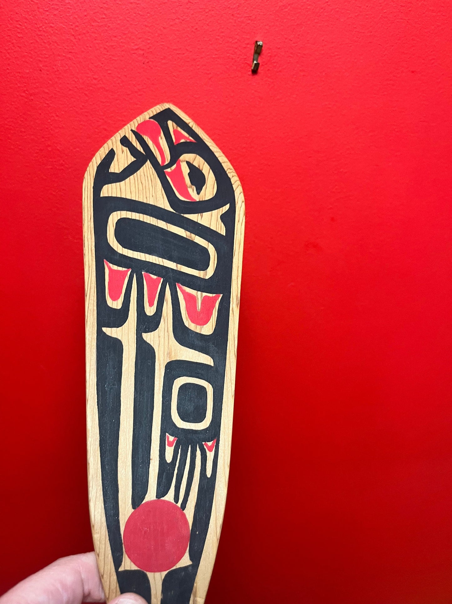 A stunning 34 x 4 wide, signed painted cedar indigenous first nations Pacific northwest coast paddle classic beautiful design