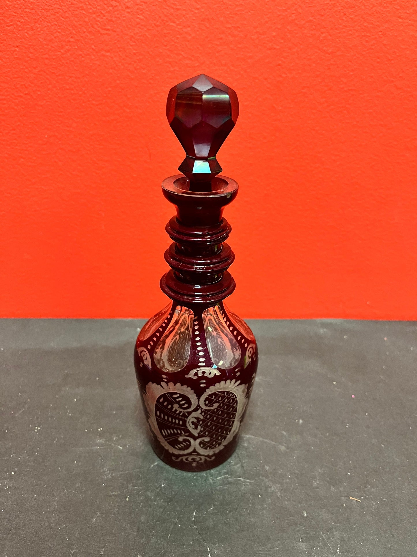 9 inch tall beautiful antique ruby etched, crystal decanter  Wonderful condition and quality