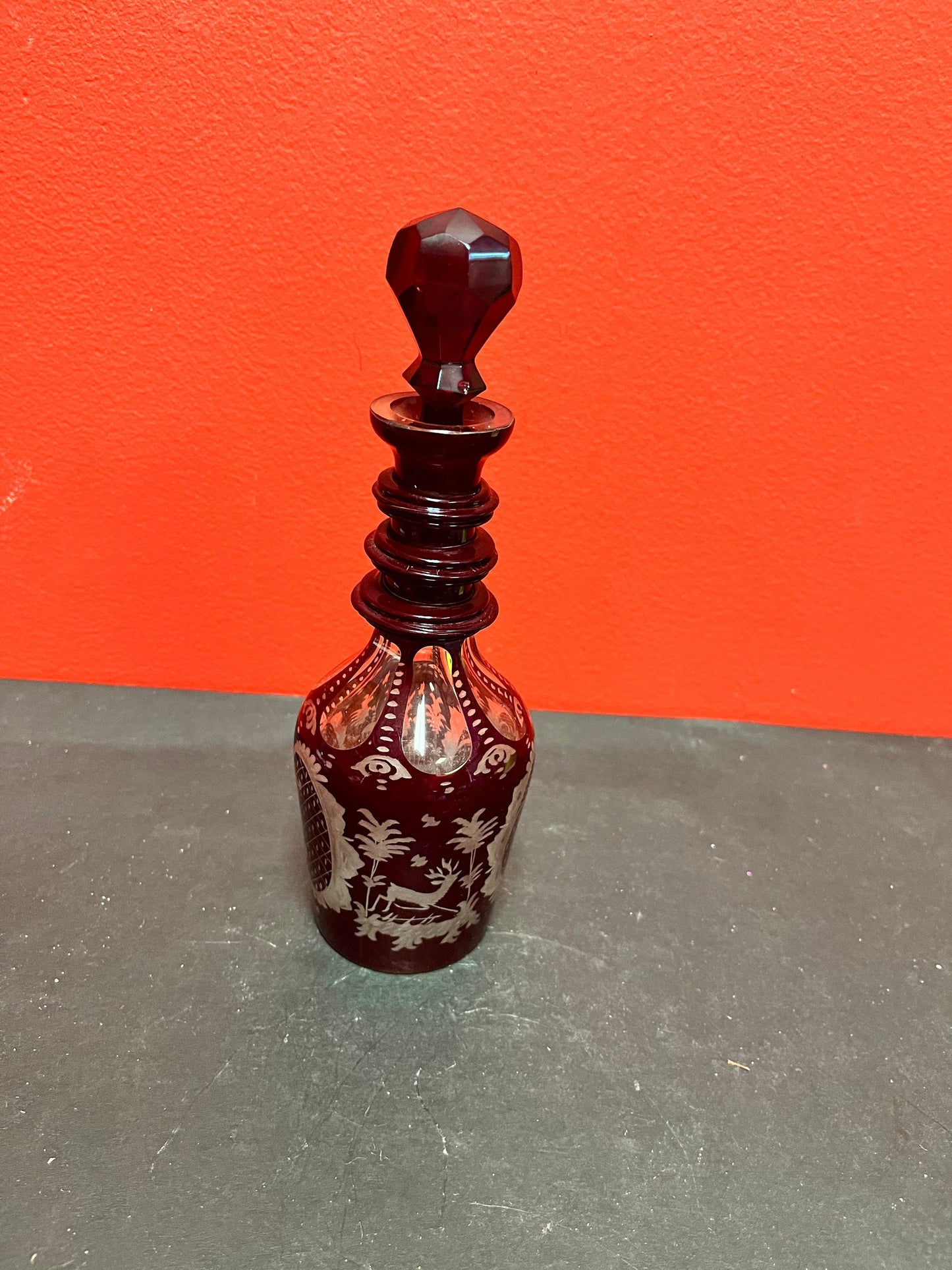 9 inch tall beautiful antique ruby etched, crystal decanter  Wonderful condition and quality