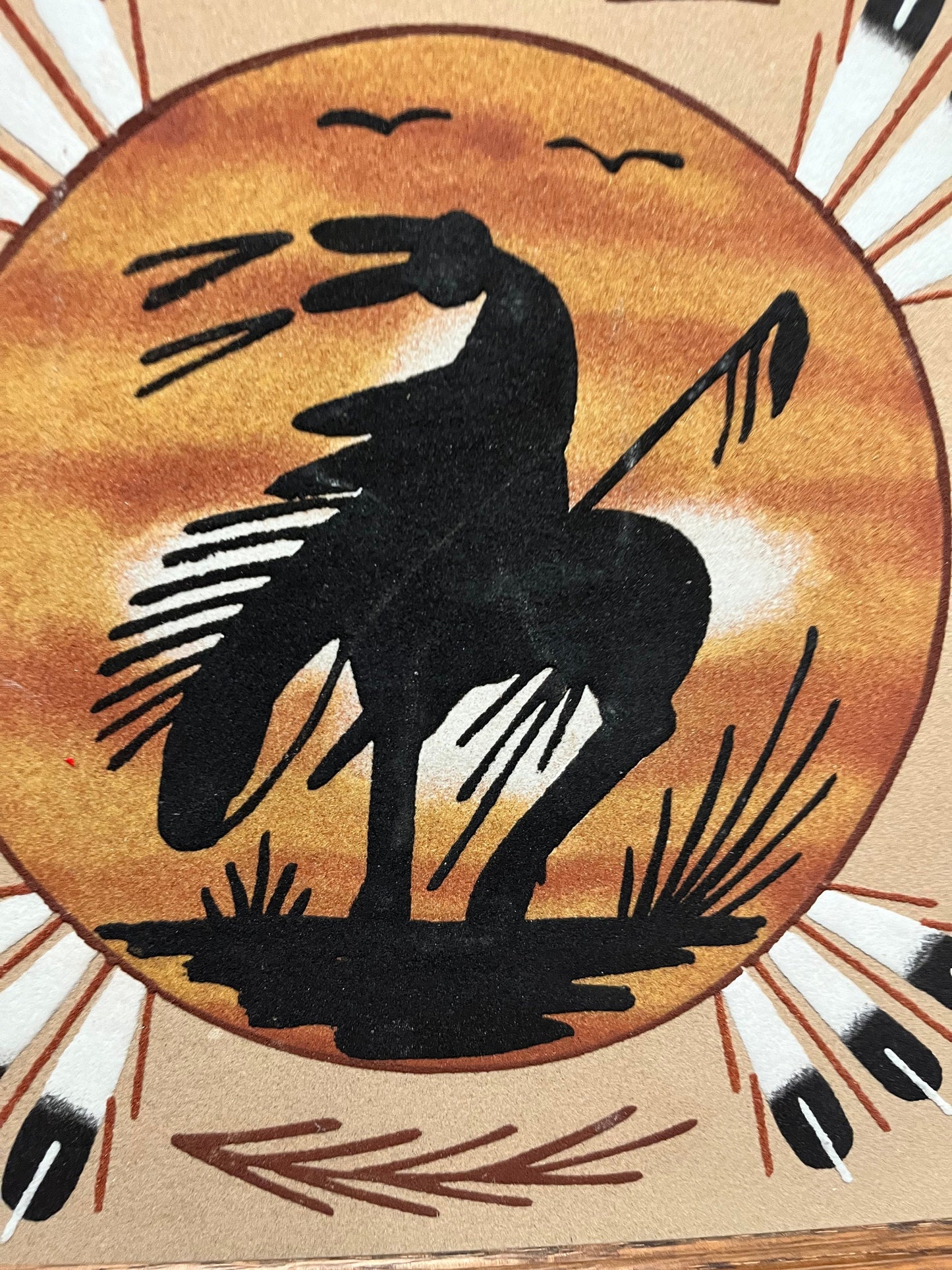 Lovely 13 inch authentic Navajo sand painting in frame    signed on back with information