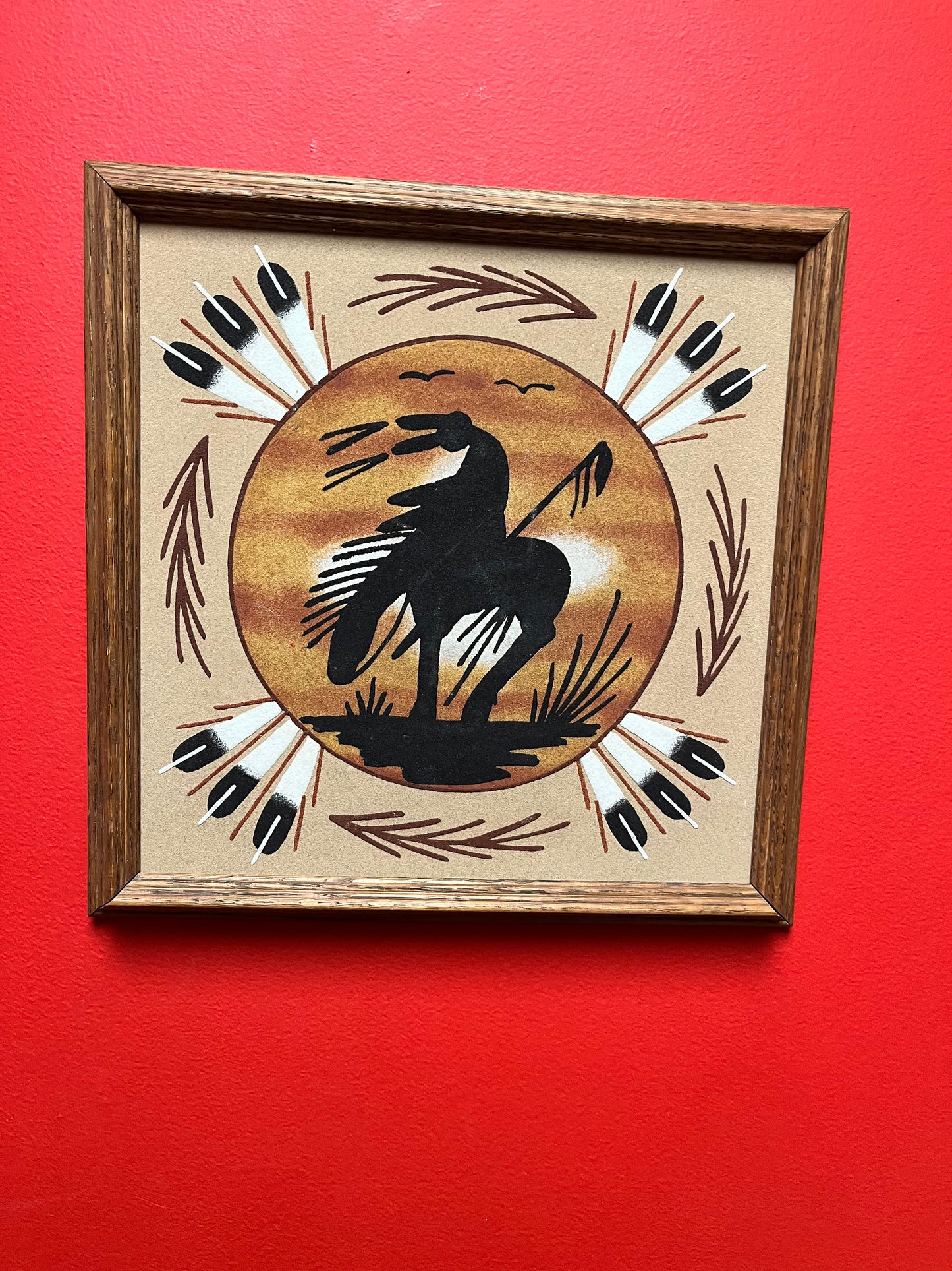 Lovely 13 inch authentic Navajo sand painting in frame    signed on back with information