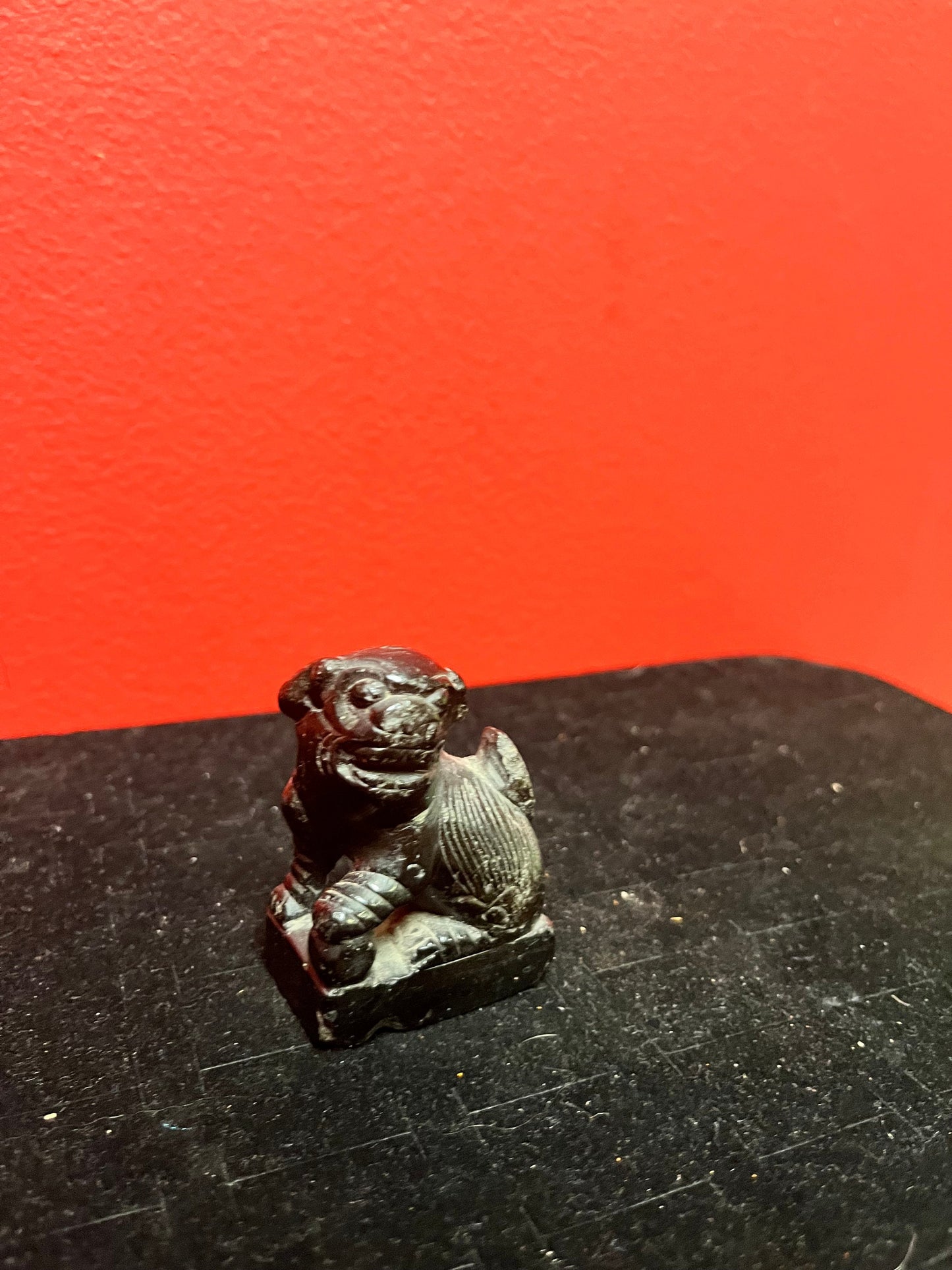 Lovely 2 inch tall stone foo dog