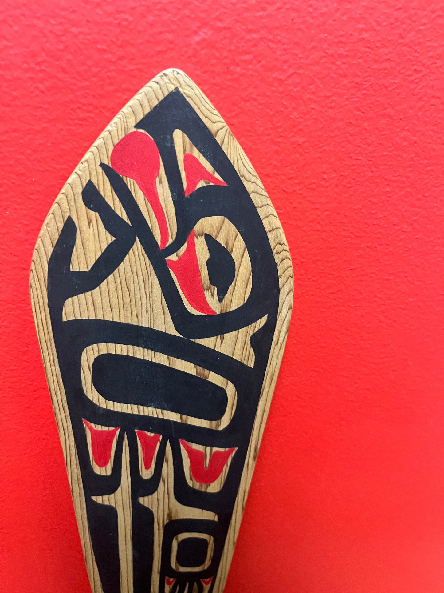 A stunning 34 x 4 wide, signed painted cedar indigenous first nations Pacific northwest coast paddle classic beautiful design
