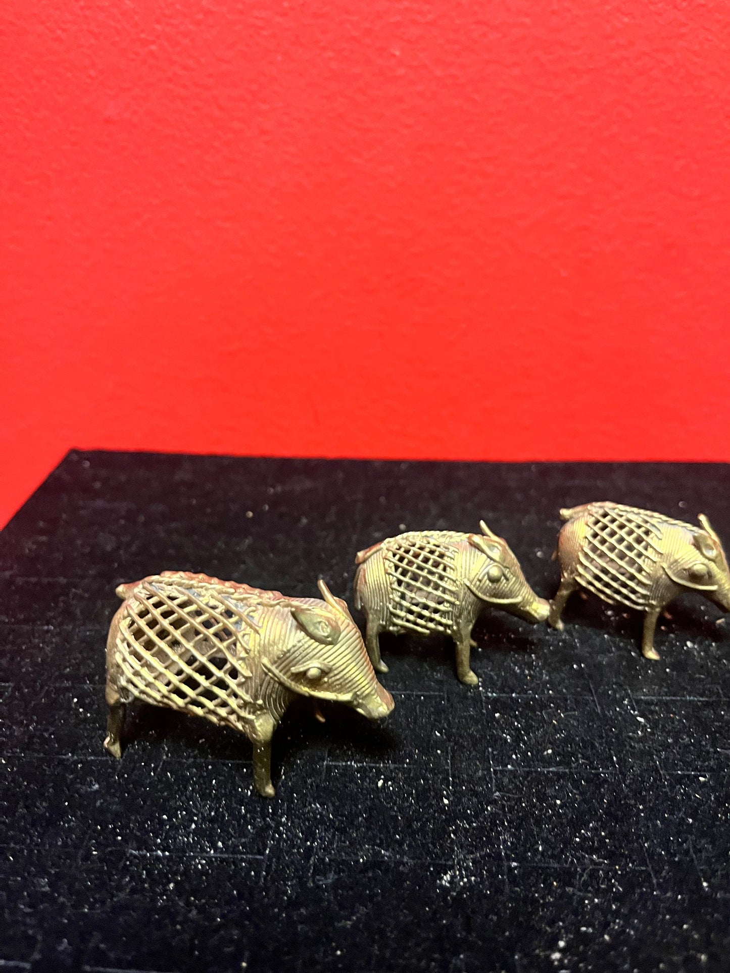Lovely set of three African Benin brass boars older 1.5 to 2 inches long each