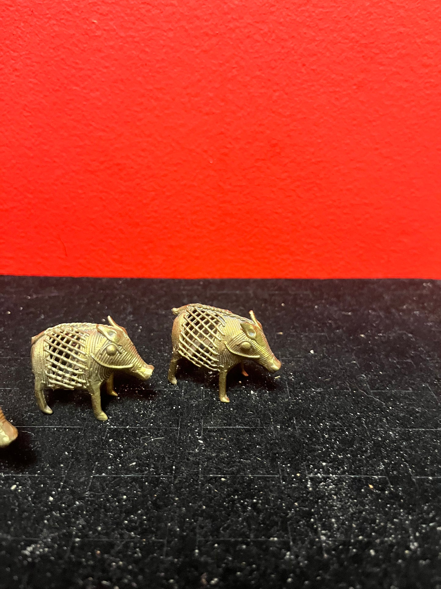 Lovely set of three African Benin brass boars older 1.5 to 2 inches long each