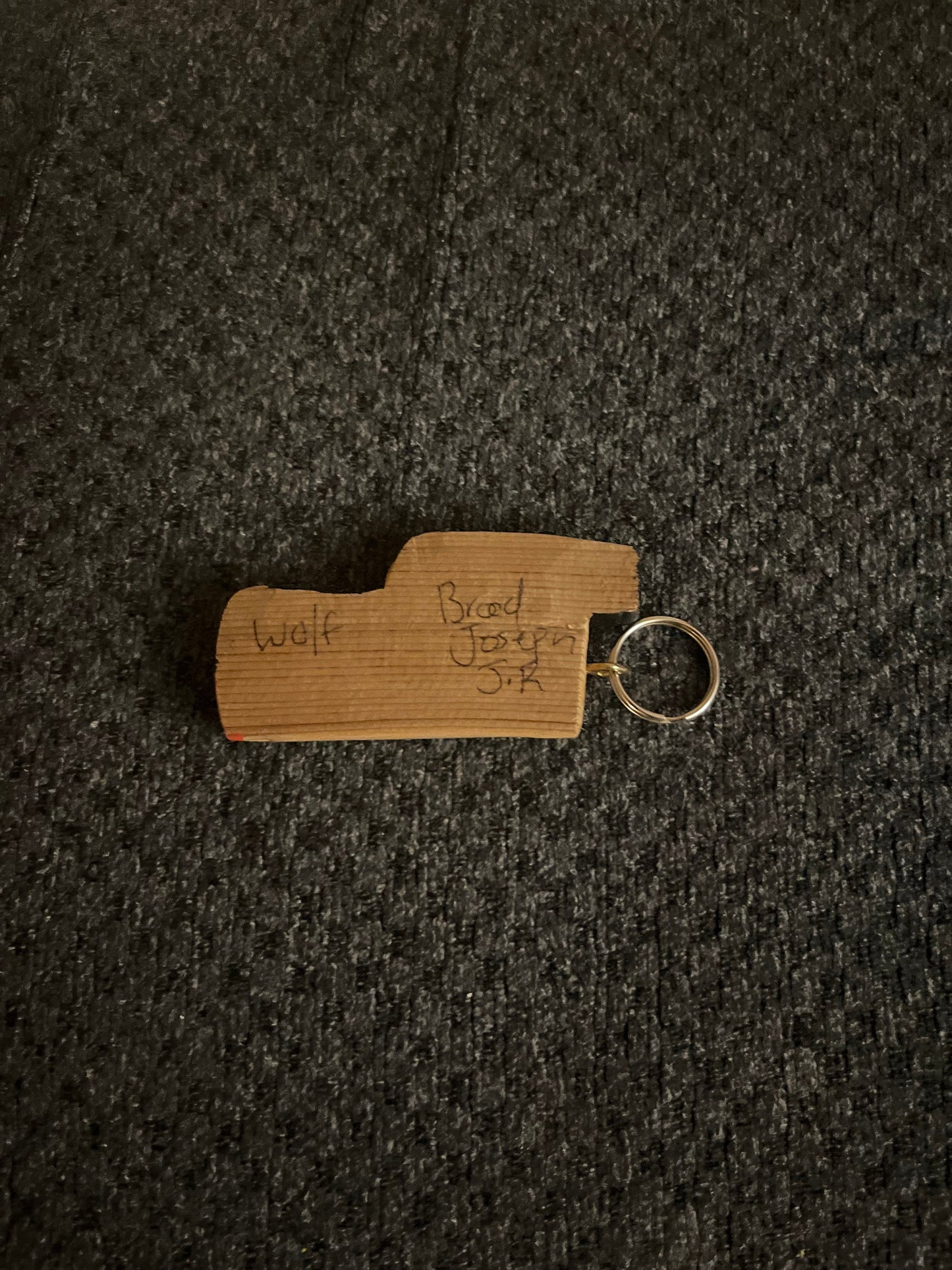 4 inch Indigenous First Nations pacific northwest coast wolf keychain carved and painted by Brad Joseph jr great gift good value