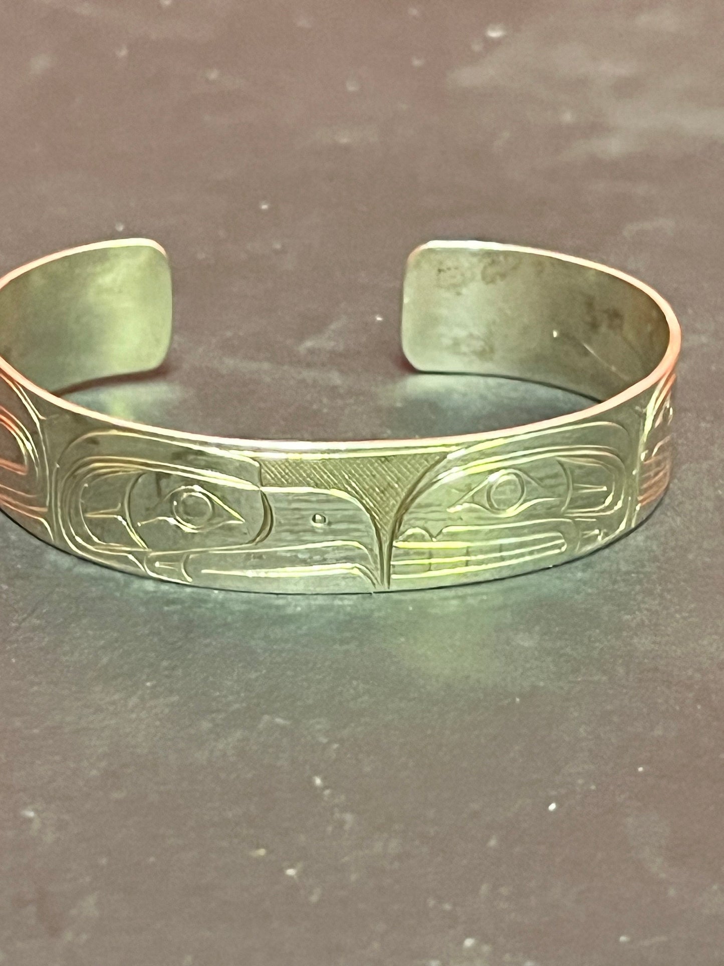 Lovely 2 1/2 inch wide heavy signed indigenous first nations Pacific Northwest Coast Sterling bracelet by famous Tony hunt wow