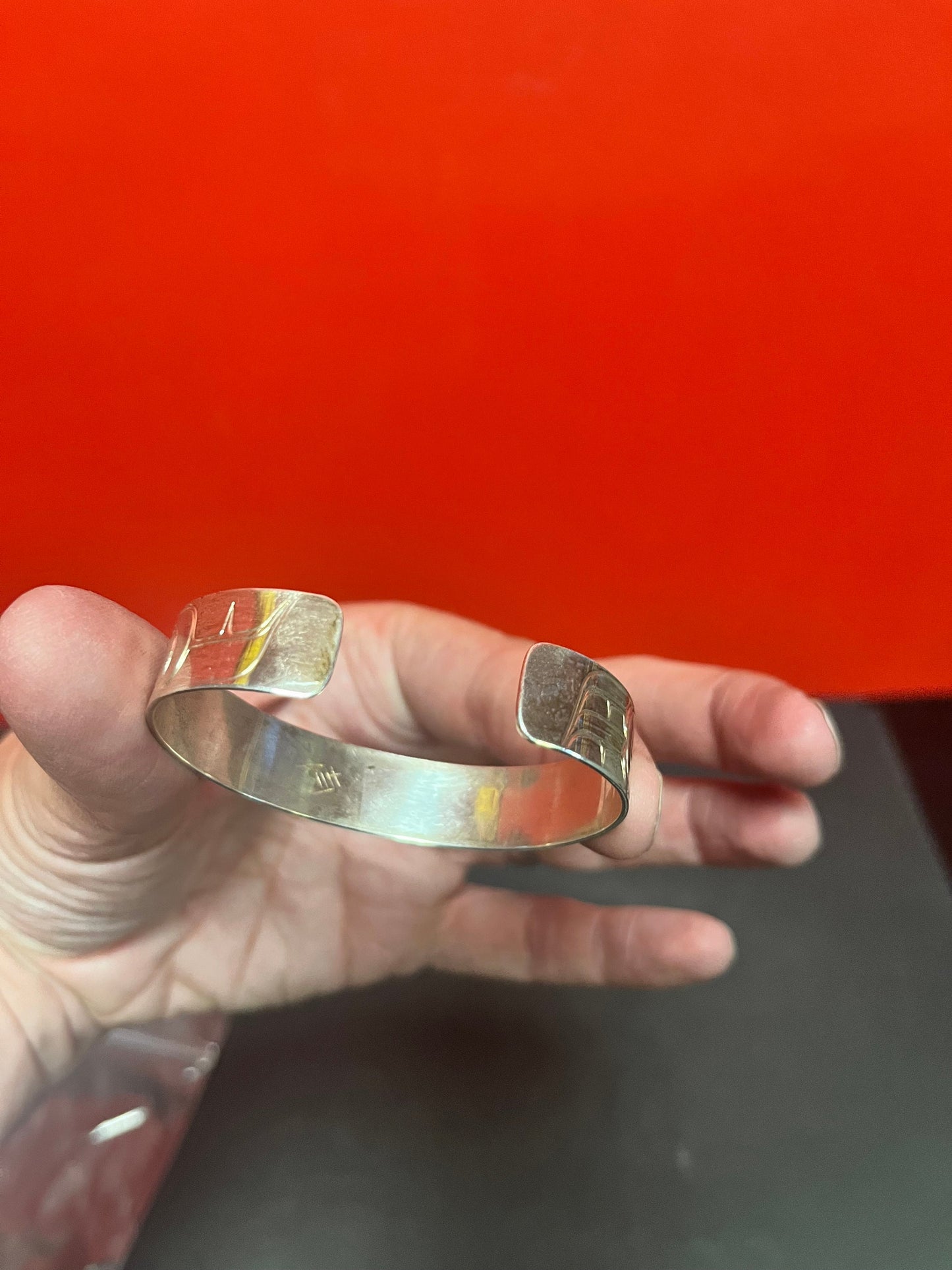 Lovely 2 1/2 inch wide heavy signed indigenous first nations Pacific Northwest Coast Sterling bracelet by famous Tony hunt wow