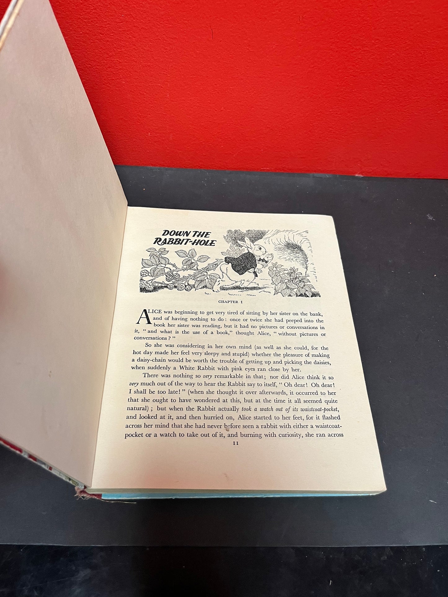 Antique 10 x 8 Alice in Wonderland book by Lewis Carroll as is see photos