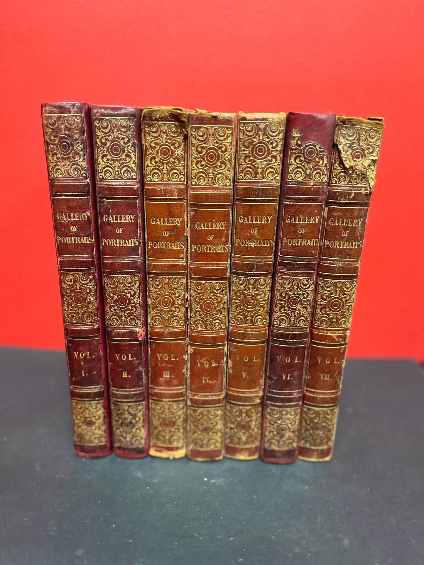 A Stunning set of seven leather bound 1833 - 1837 Gallery of portraits books good antique condition printed by William CLOWES wow set