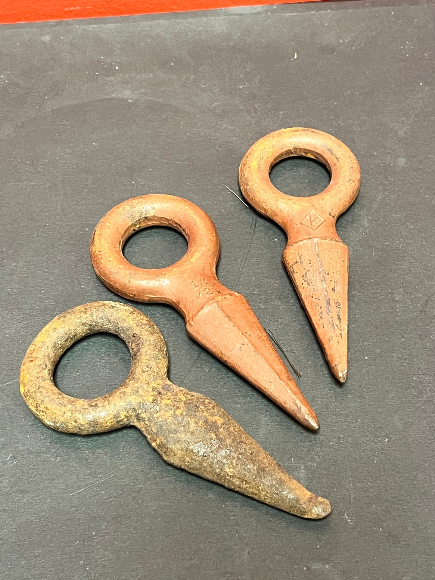 A  Group of 3 - 5 inch logging boom spikes from Vancouver island  wonderful patina and look  so cool