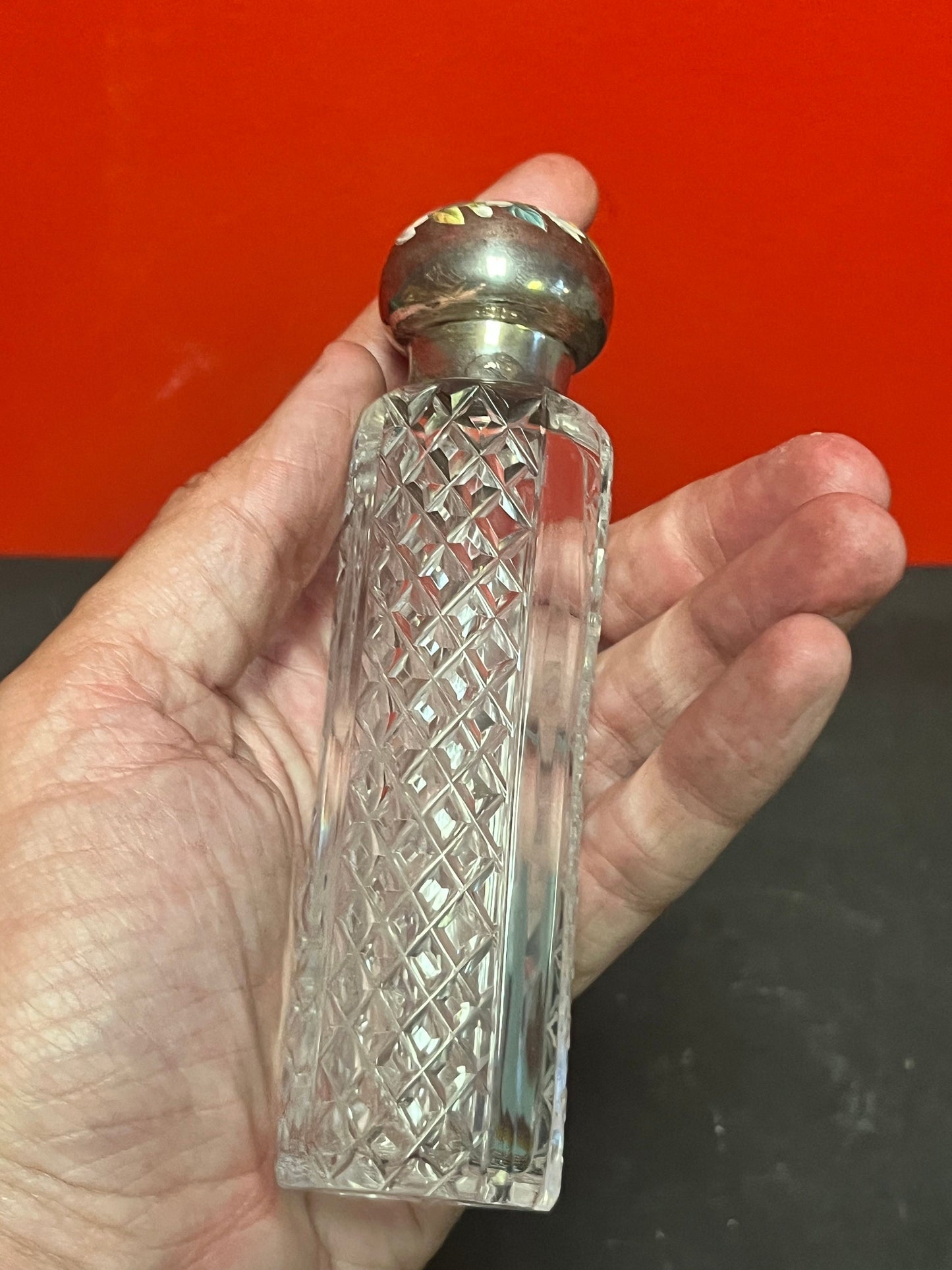 Beautiful 5 1/2 inch tall, antique crystal and silver top perfume bottle London 1888 nice enamelling on top great value