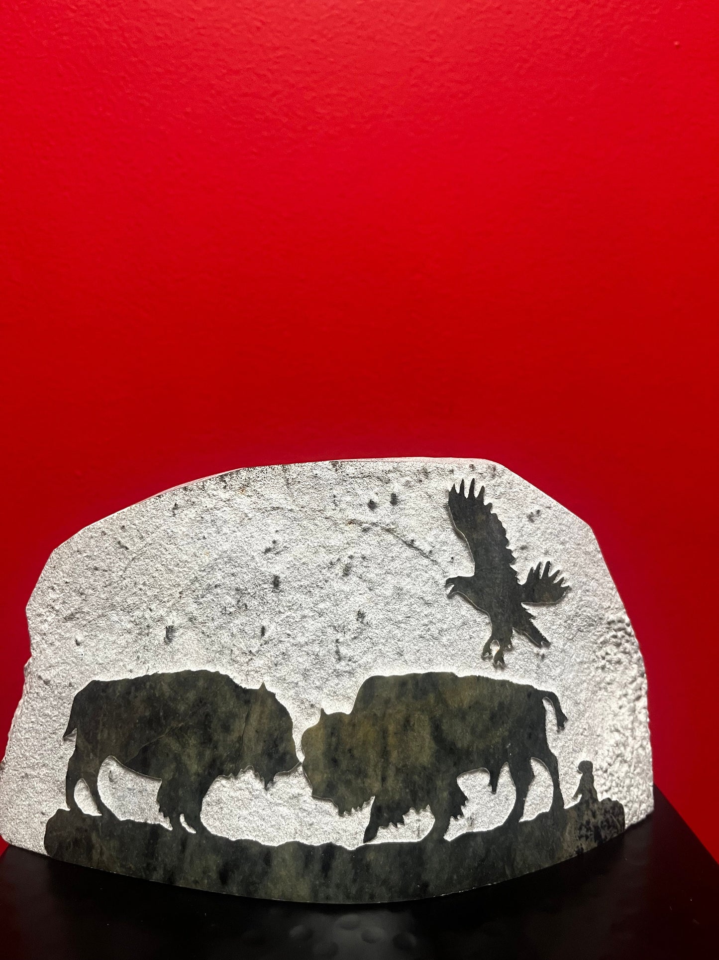 8 x 4 x 1  inch carved stone signed carving  buffalos with eagle  unique and wonderful