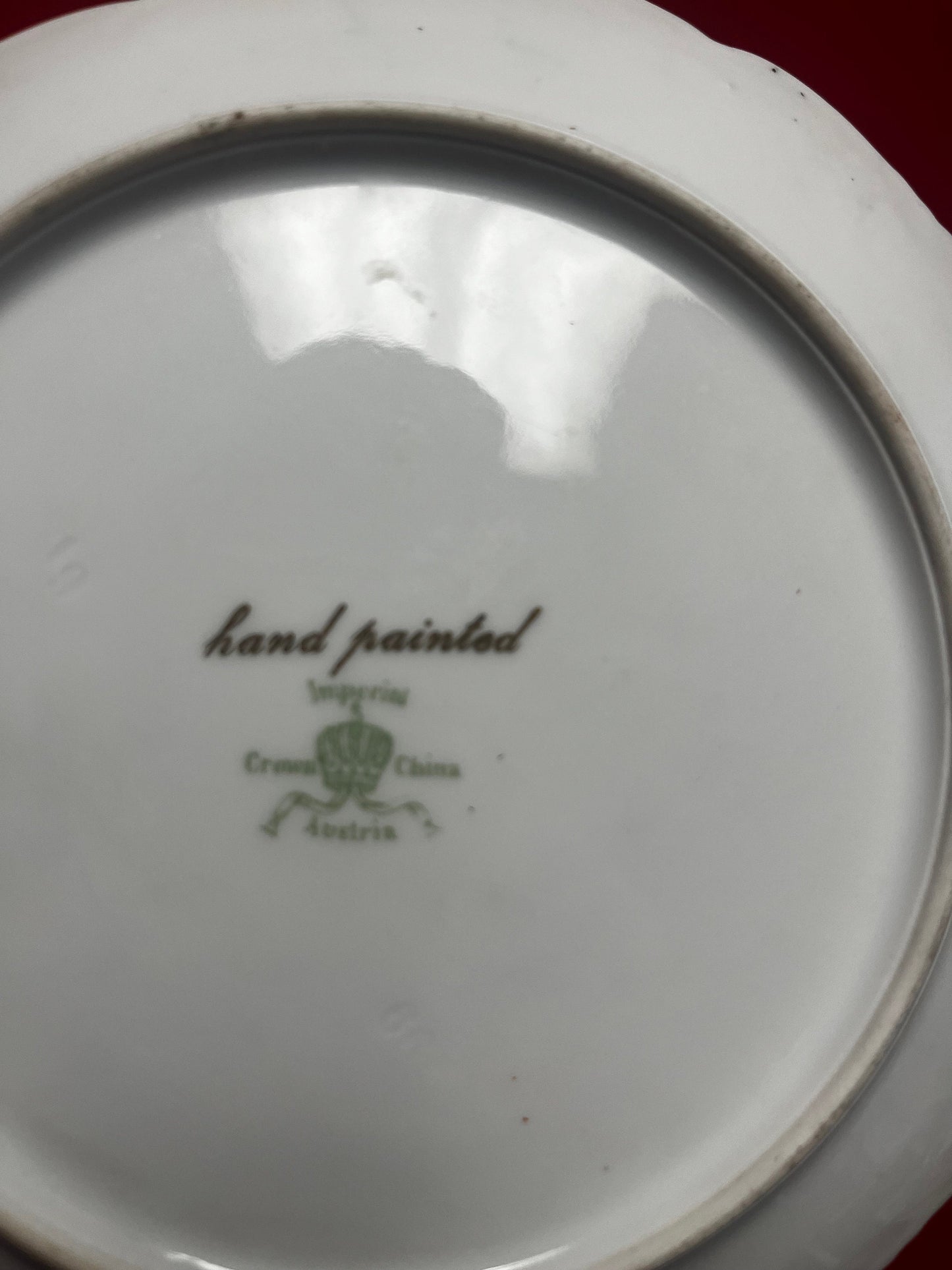 Beautiful 7 1/2 inch hand painted Austrian signed plate with gilded edges  beautiful gift