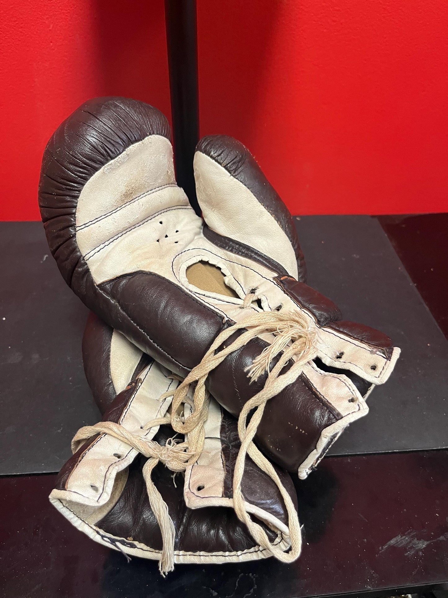 Lovely pair of 12 inch long vintage leather TRIO boxing gloves in good used condition - great value