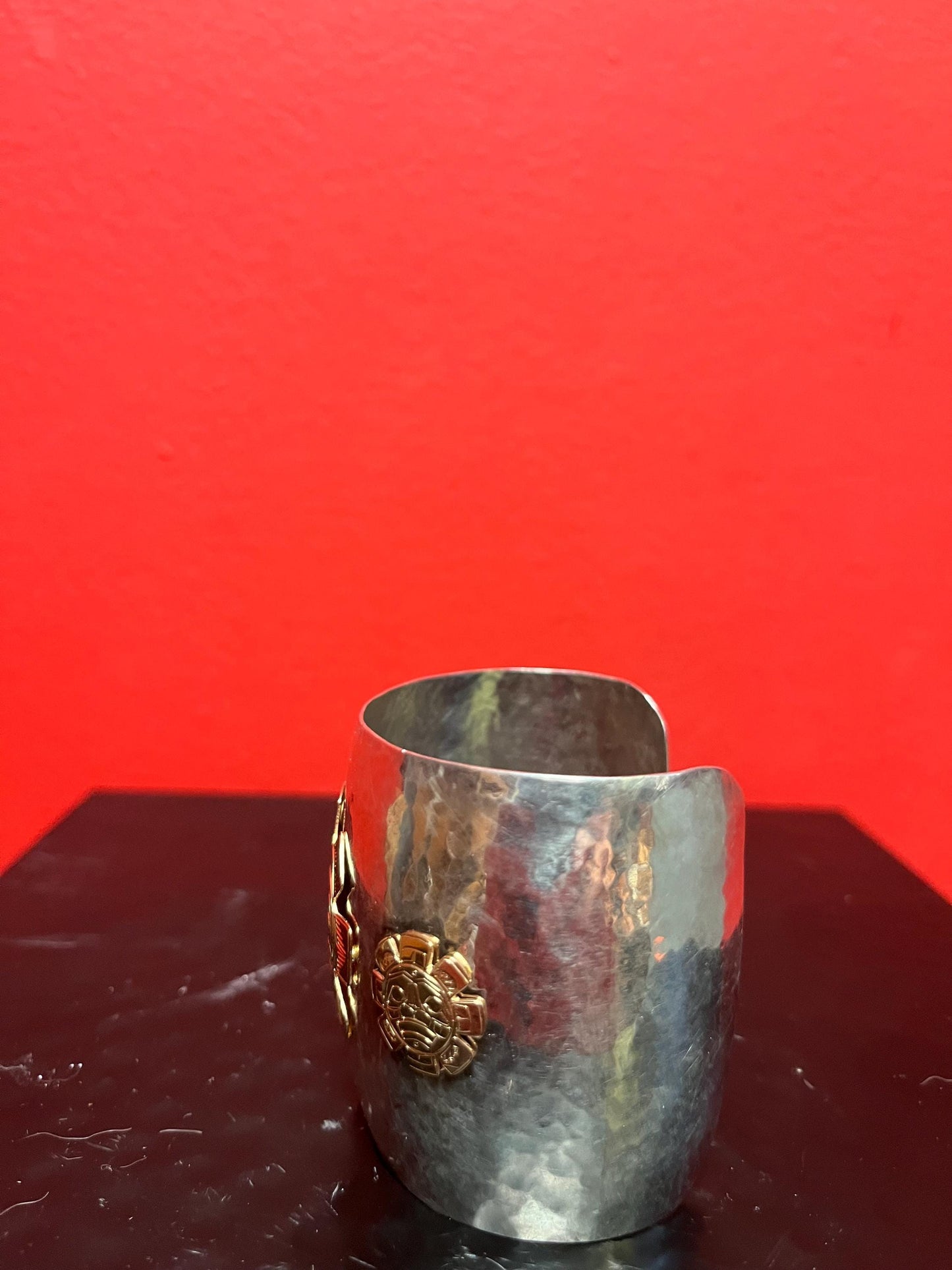 Magnificent signed heavy sterling and gold sun mask cuff indigenous First NationsNorthwest Coast 2 1/4 wide and 2 high, 7 circumference