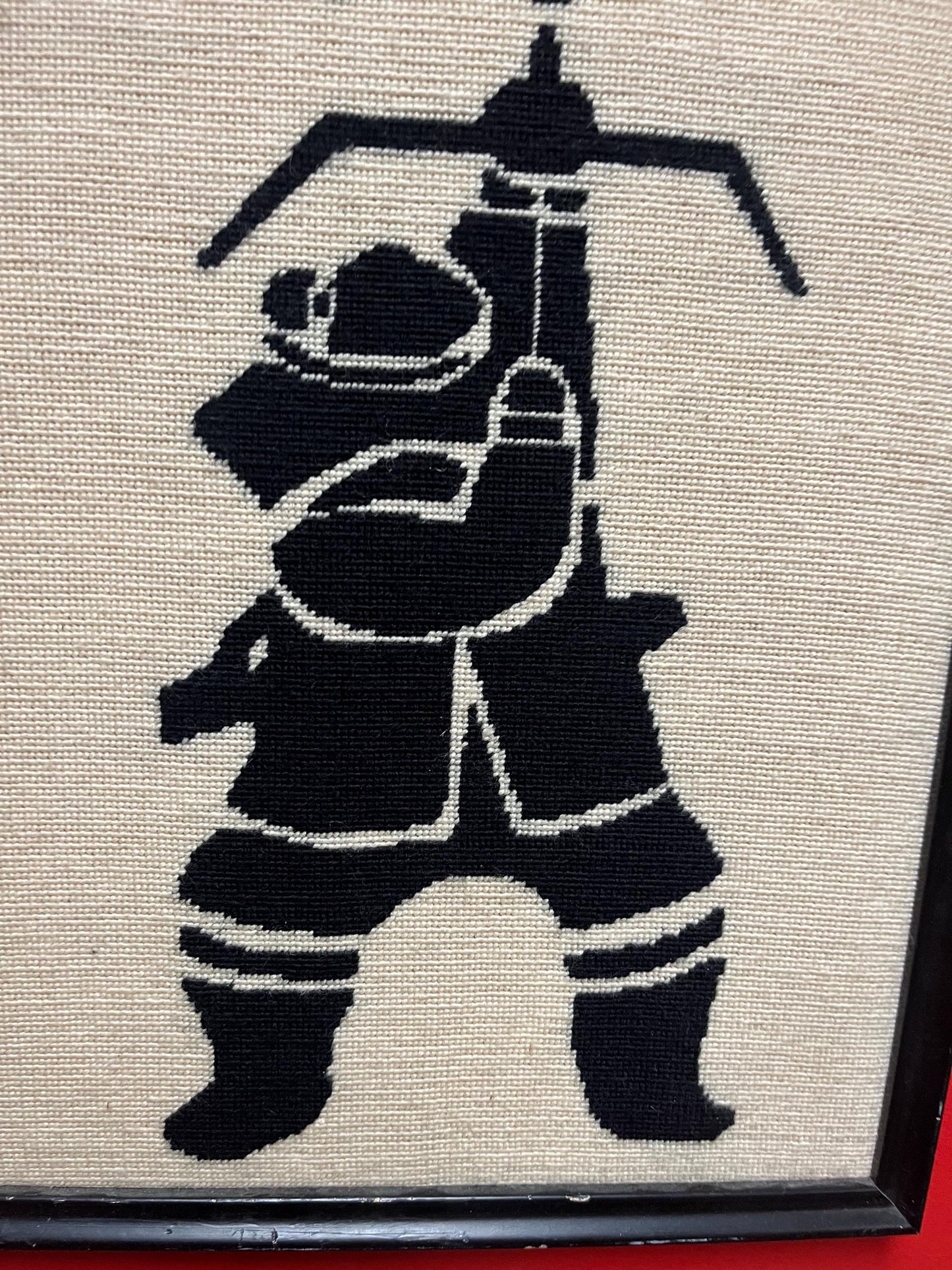 19 x 15 old woven needlepoint picture of an Eskimo hunting in frame great imagery and condition unusual
