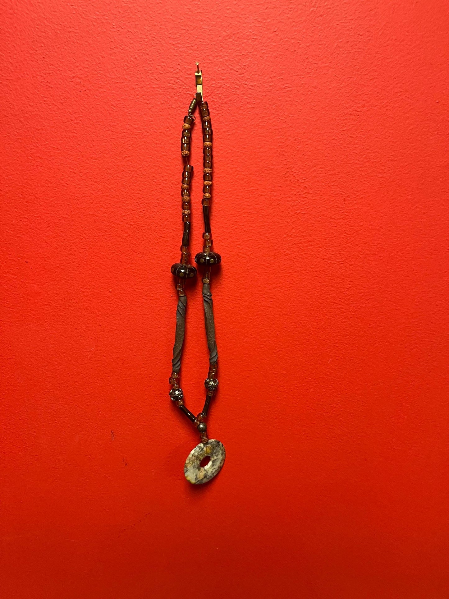 Approximately 26 inch long stone, beads and wood necklace  very funky and beautiful  great gift -