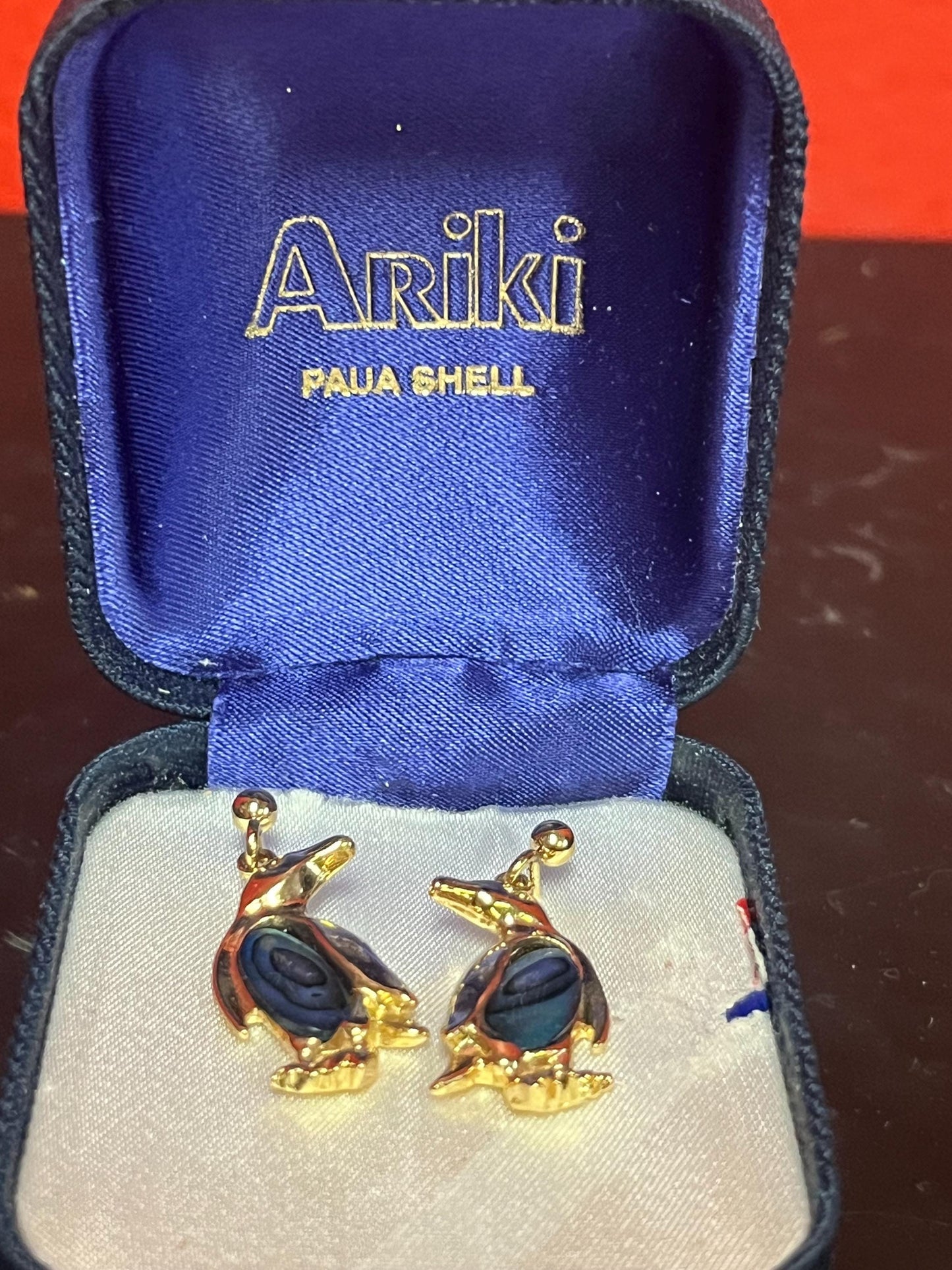 Very cool penguin earrings in original box   great gift