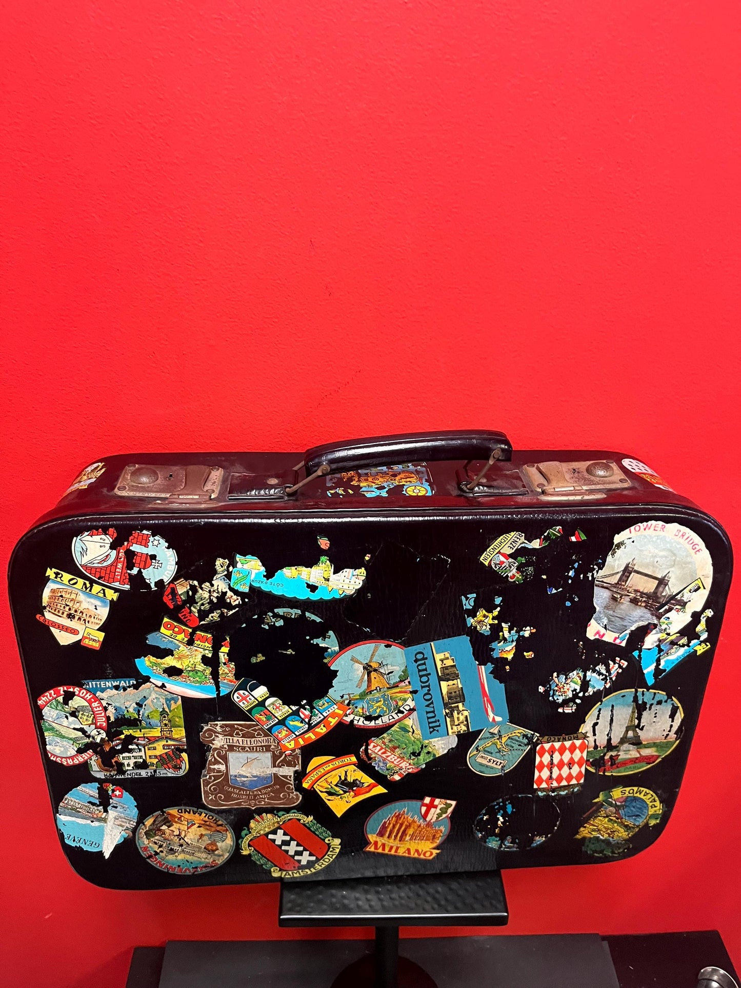 One of a kind 1920s  21 x 16 x 5 deep travel suitcase with the original stickers   amazing for use or decoration  wow