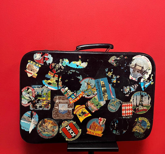 One of a kind 1920s  21 x 16 x 5 deep travel suitcase with the original stickers   amazing for use or decoration  wow