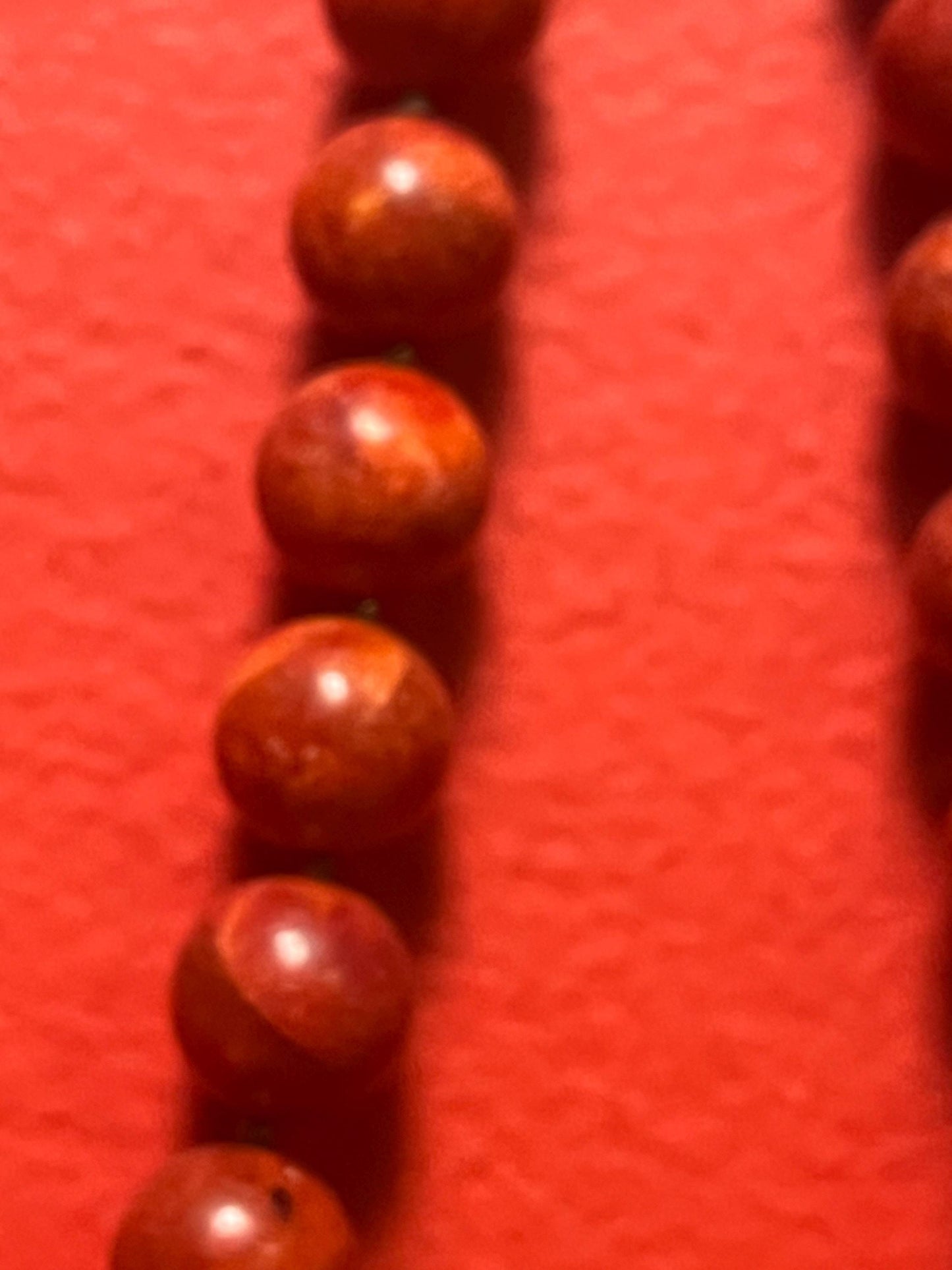 Beautiful approximately 20 inch long, red stone and silver plate pendant necklace bright and beautiful