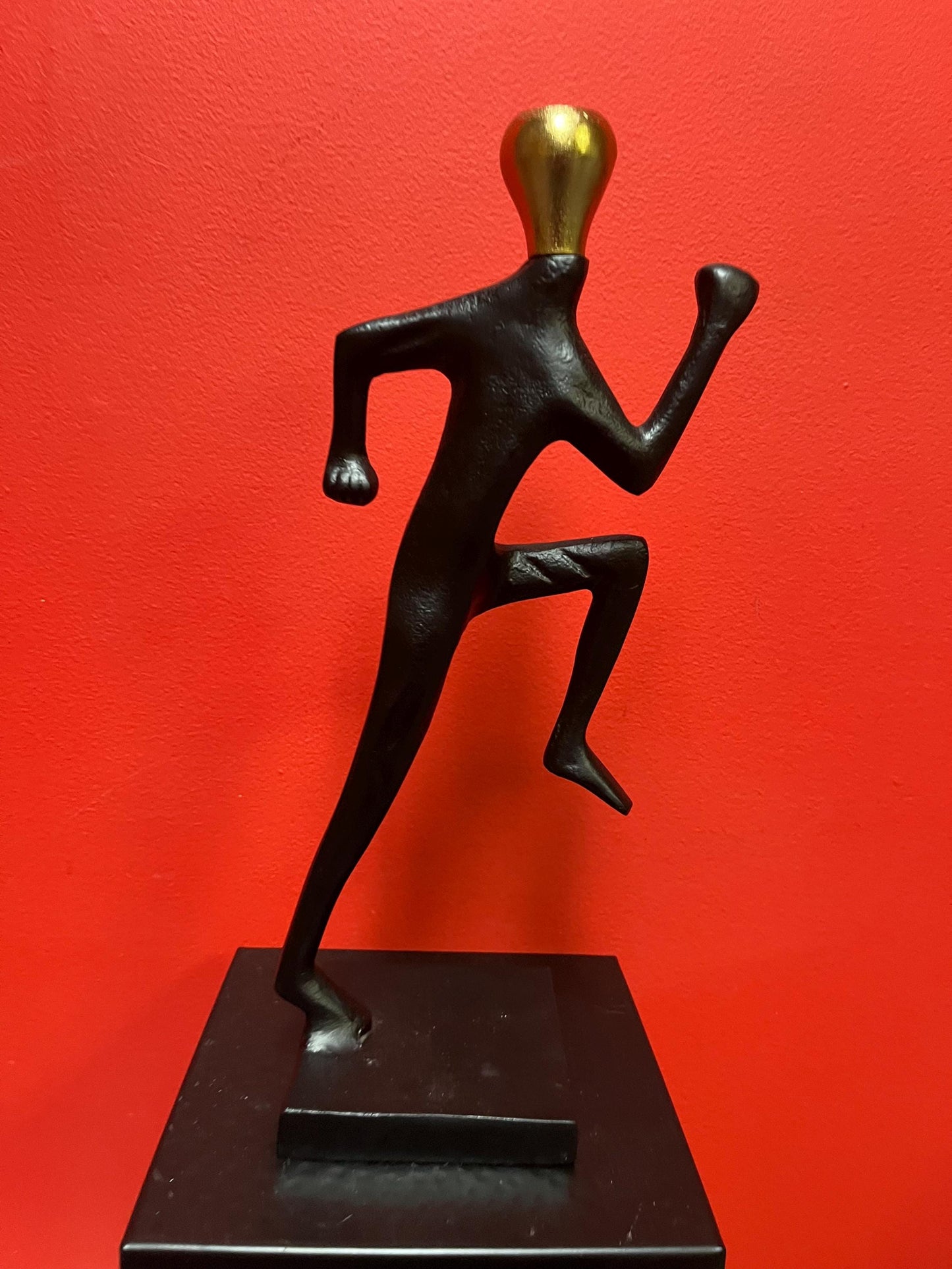 Stunning 14 inch tall cast metal running man candlestick holder impressive and unique - great gift for a runner