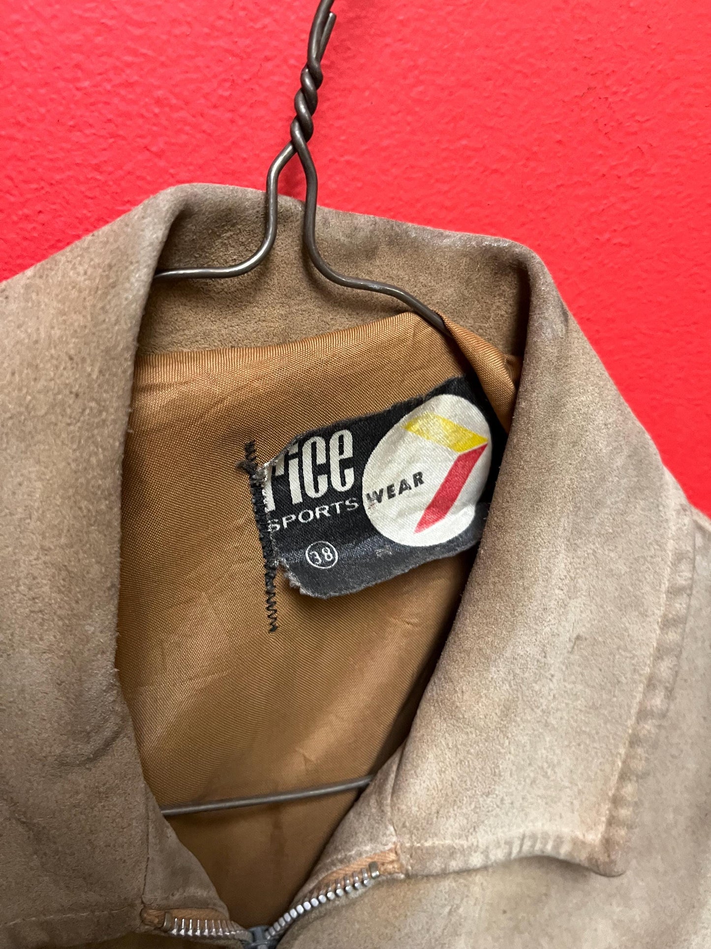 Vintage 33 inch long by 14 inch chest cowhide Cherokee style jacket with tassels very cool and ready to wear