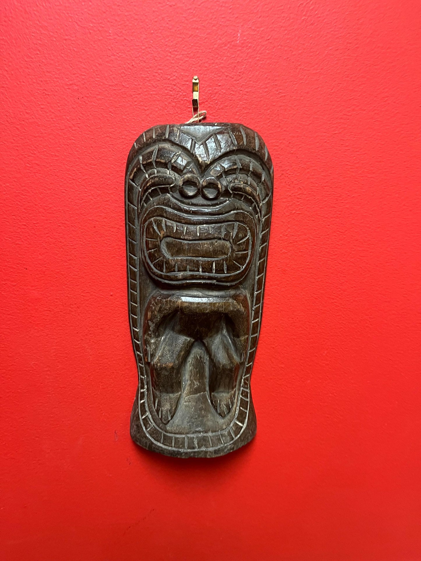 Vintage authentic 12 x 5 wide tiki wood wall hanging great age and amazing patina and imagery wow