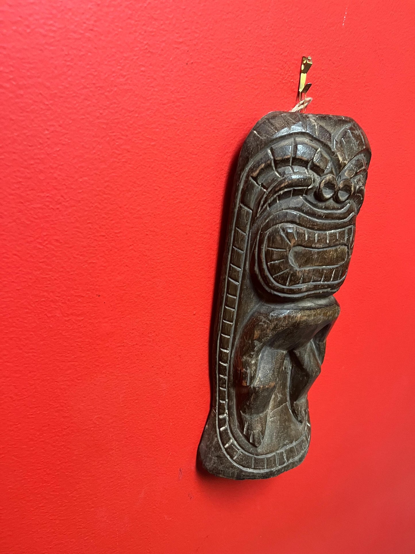 Vintage authentic 12 x 5 wide tiki wood wall hanging great age and amazing patina and imagery wow