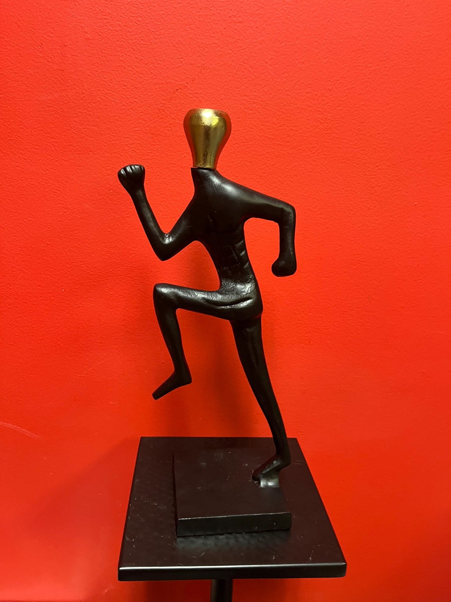 Stunning 14 inch tall cast metal running man candlestick holder impressive and unique - great gift for a runner