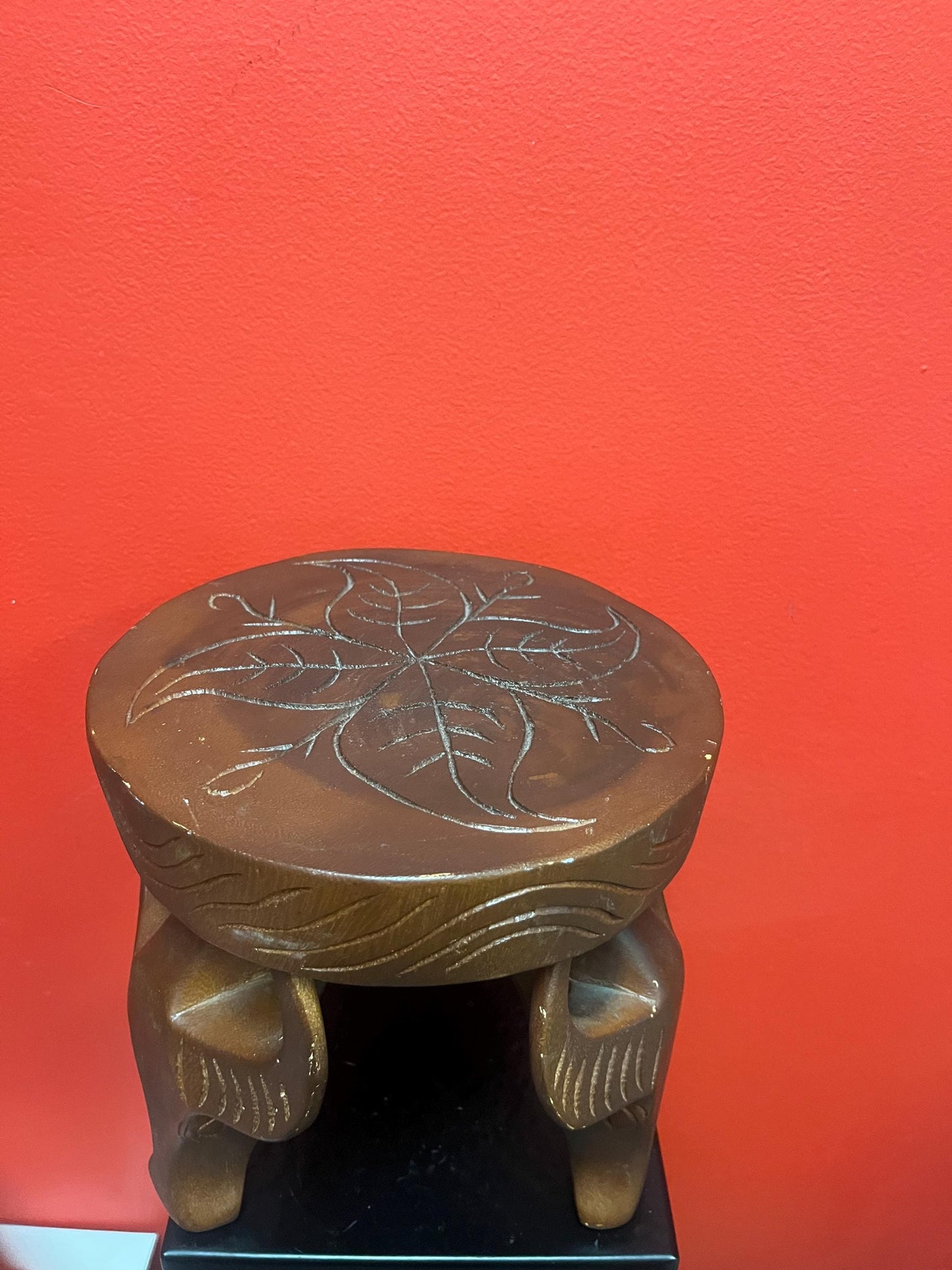 Very cool African 8 x 8” stool with legs the shape of yaks — great conversation piece and great value