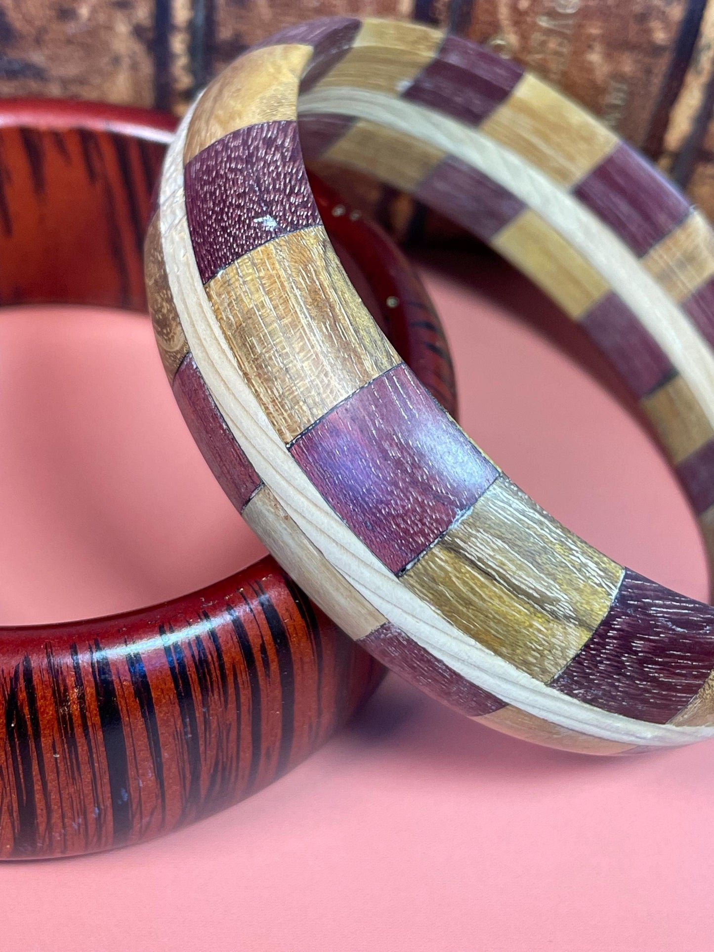 Lot of 2 Wooden Bracelets 3-Inch Diameter, Striped and Patchwork Designs