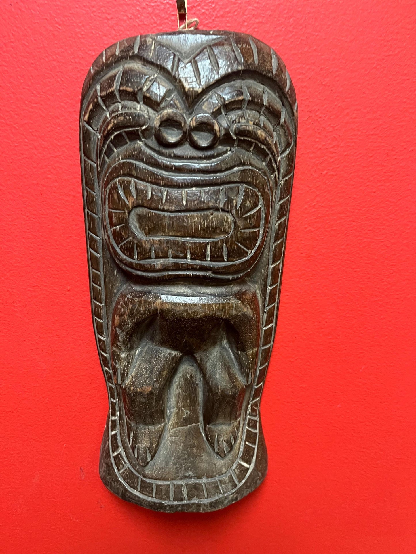 Vintage authentic 12 x 5 wide tiki wood wall hanging great age and amazing patina and imagery wow