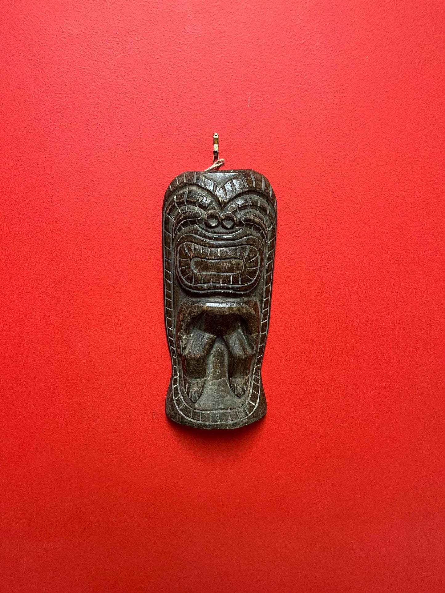 Vintage authentic 12 x 5 wide tiki wood wall hanging great age and amazing patina and imagery wow