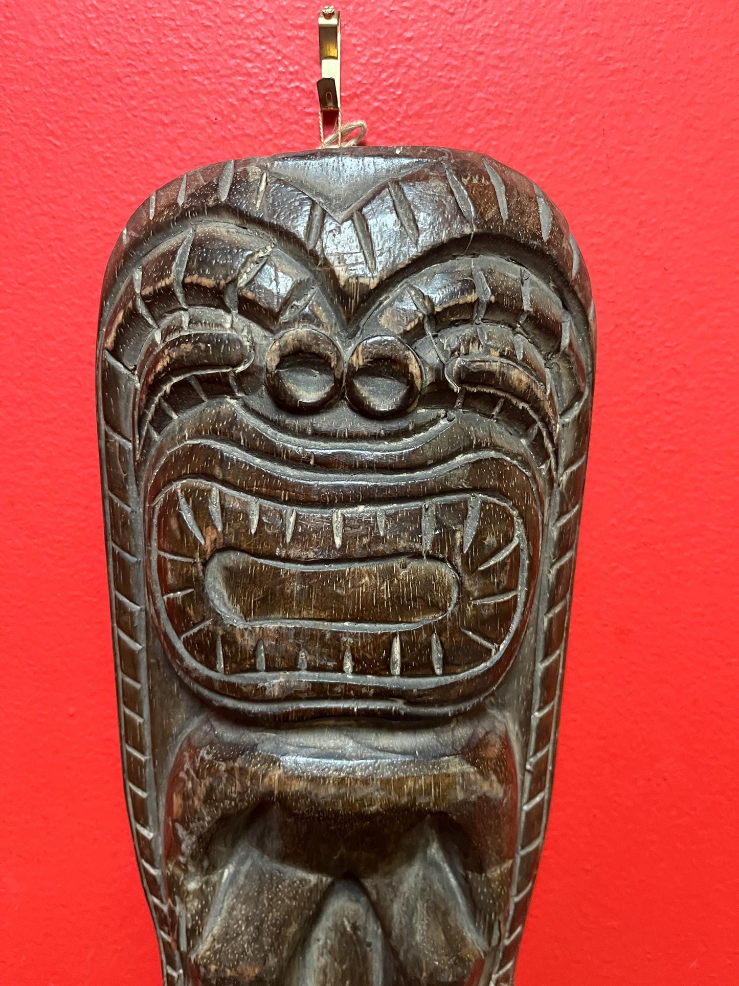 Vintage authentic 12 x 5 wide tiki wood wall hanging great age and amazing patina and imagery wow