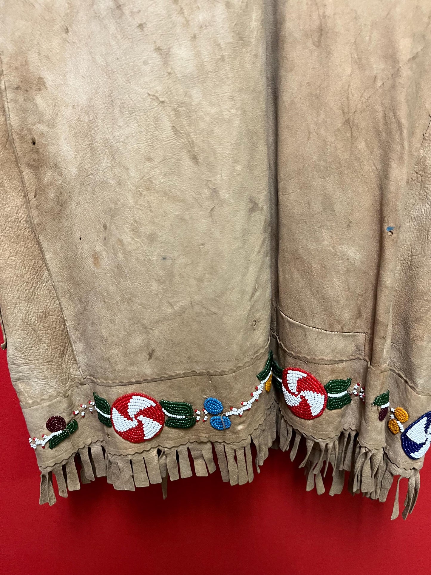Stunning, indigenous native antique beaded jacket approximately 32 inches long and 16 inch chest medium to large minor damage see photo